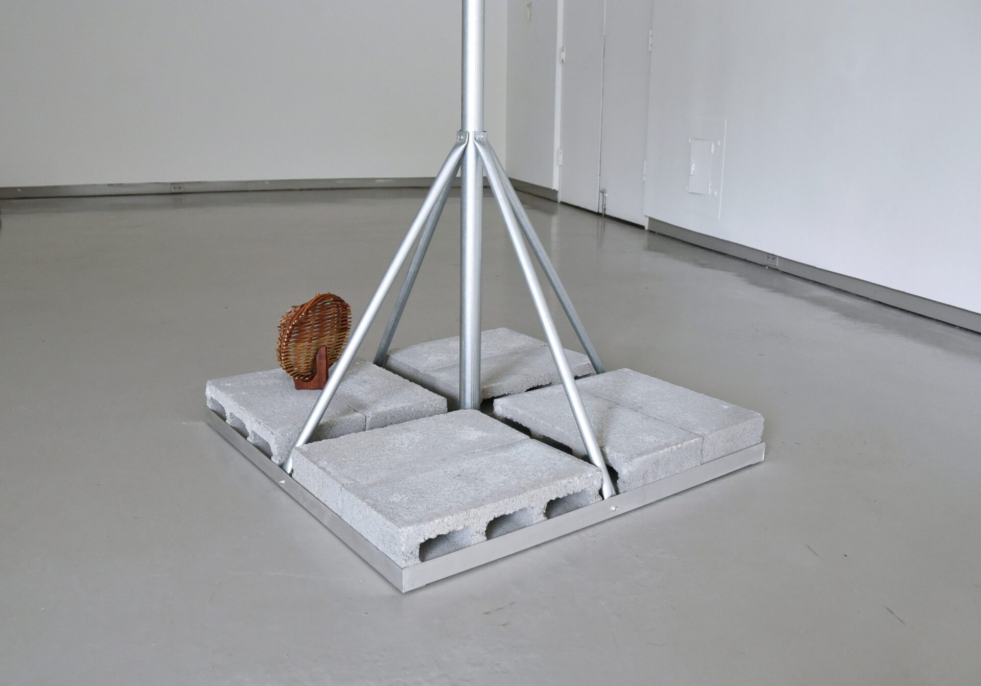 Jerome Sicard, CMFMFA, 2022, Aluminum, cinder blocks, steel, willow, zinc, 36” x 8’ 10” x 36”.