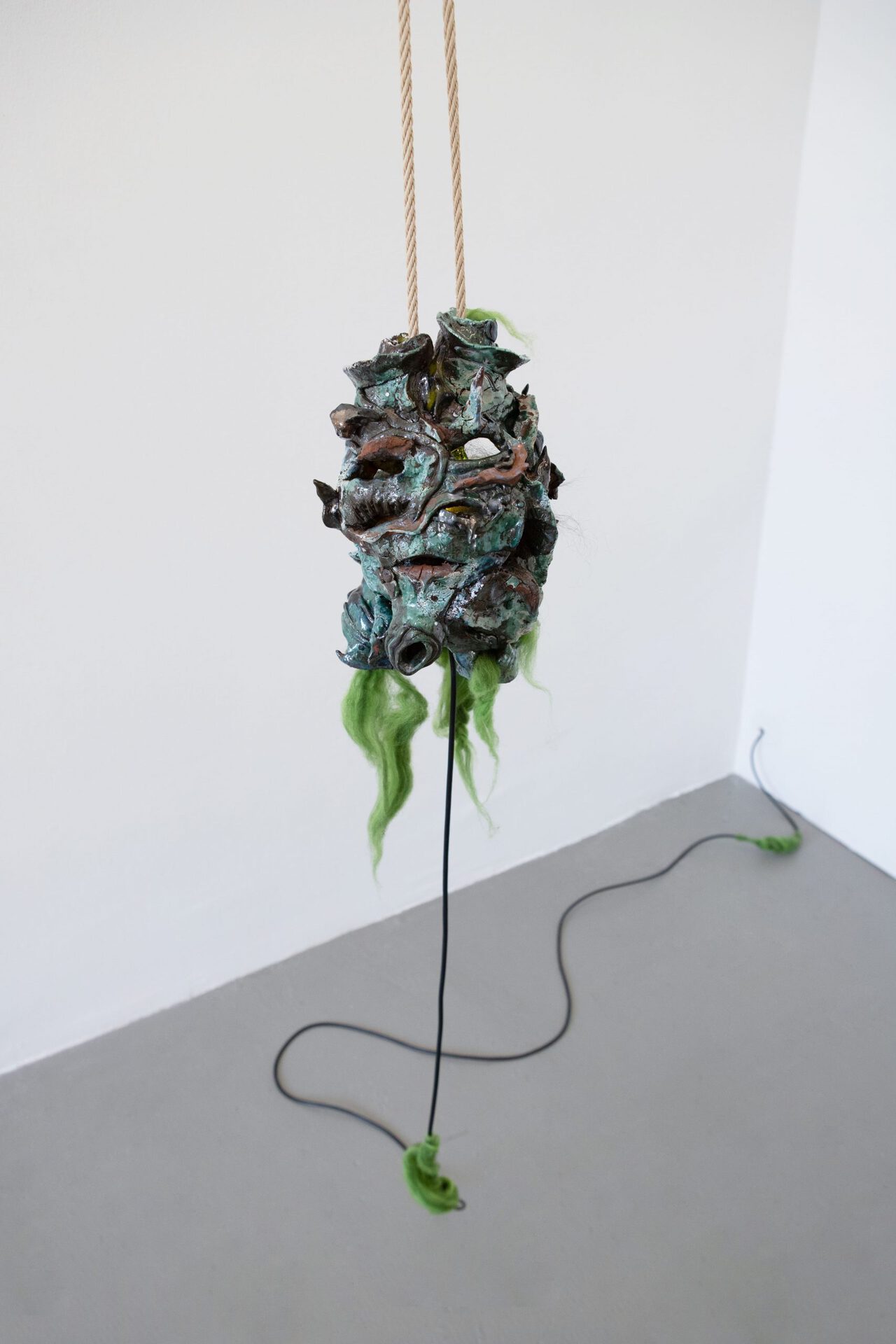 Maya Hottarek, Hydrosphere 2, Ceramic, sheep hair, light bulb, 20 x 44 x 19 cm | 2020
