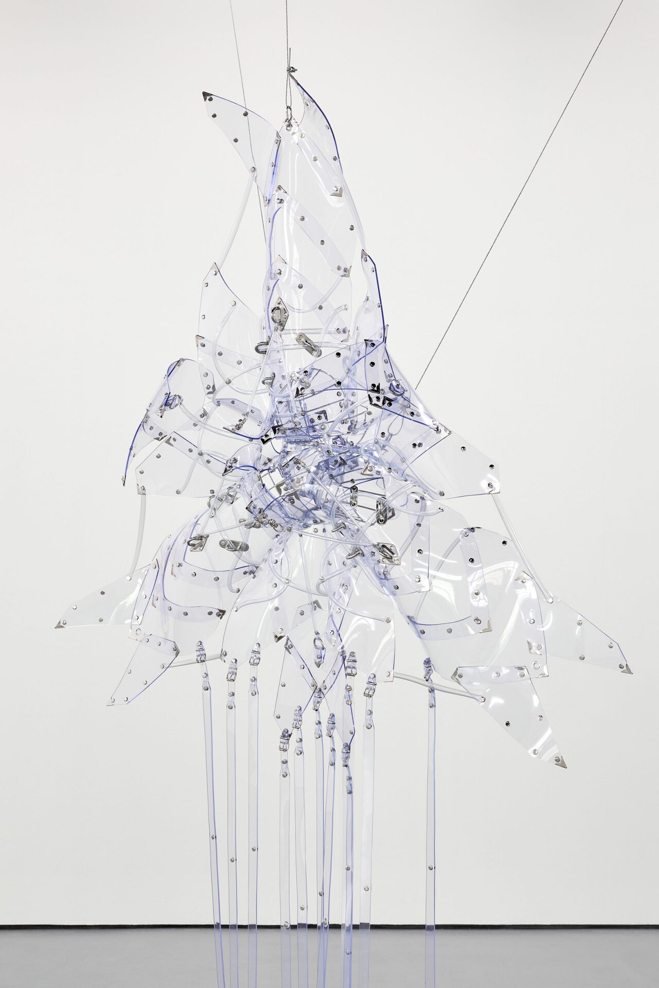 Floryan Varennes, Matriarche, 2022, detail muzzles, medical tubes, medical PVC, stainless-steel fasteners, rivets, rings, medical instruments 160 x 160 cm