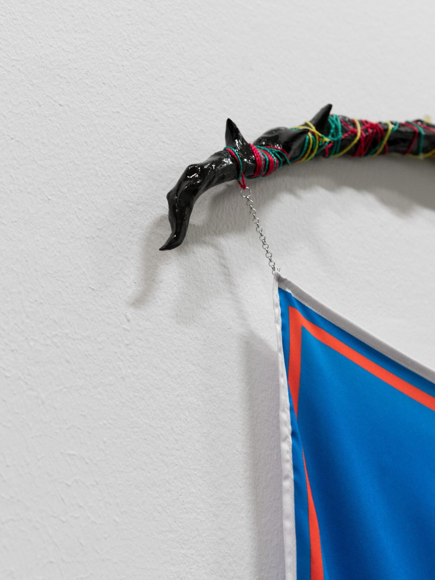 Pavel Polshchikov Red Order gonfalon 2021, synthetic silk digital printing, steel chains, polymer clay, epoxy resin, ropes