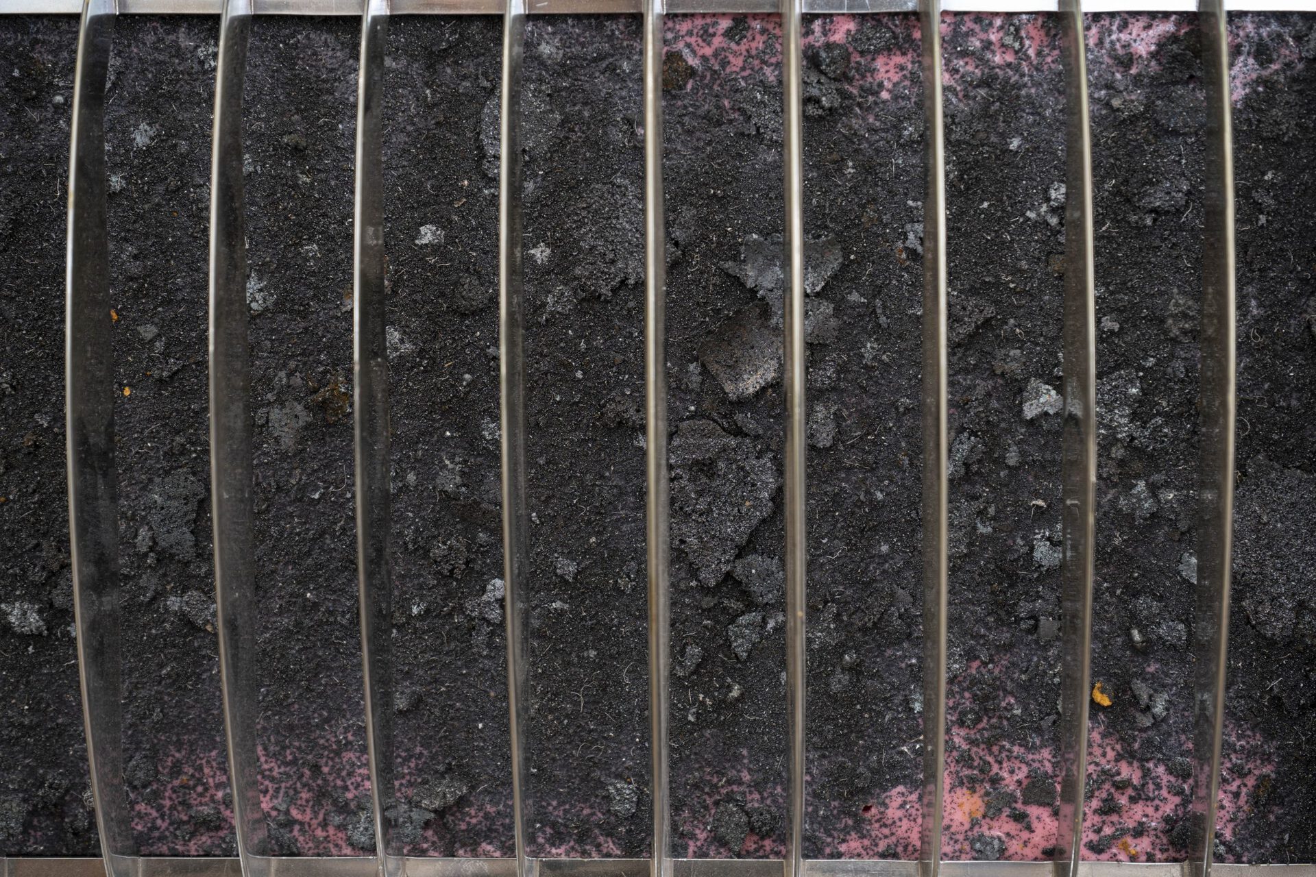 Šimon Chovan, Chiral filter (right channel), 2022, Black steel, steel dust, soil, silicone, Courtesy of the artist