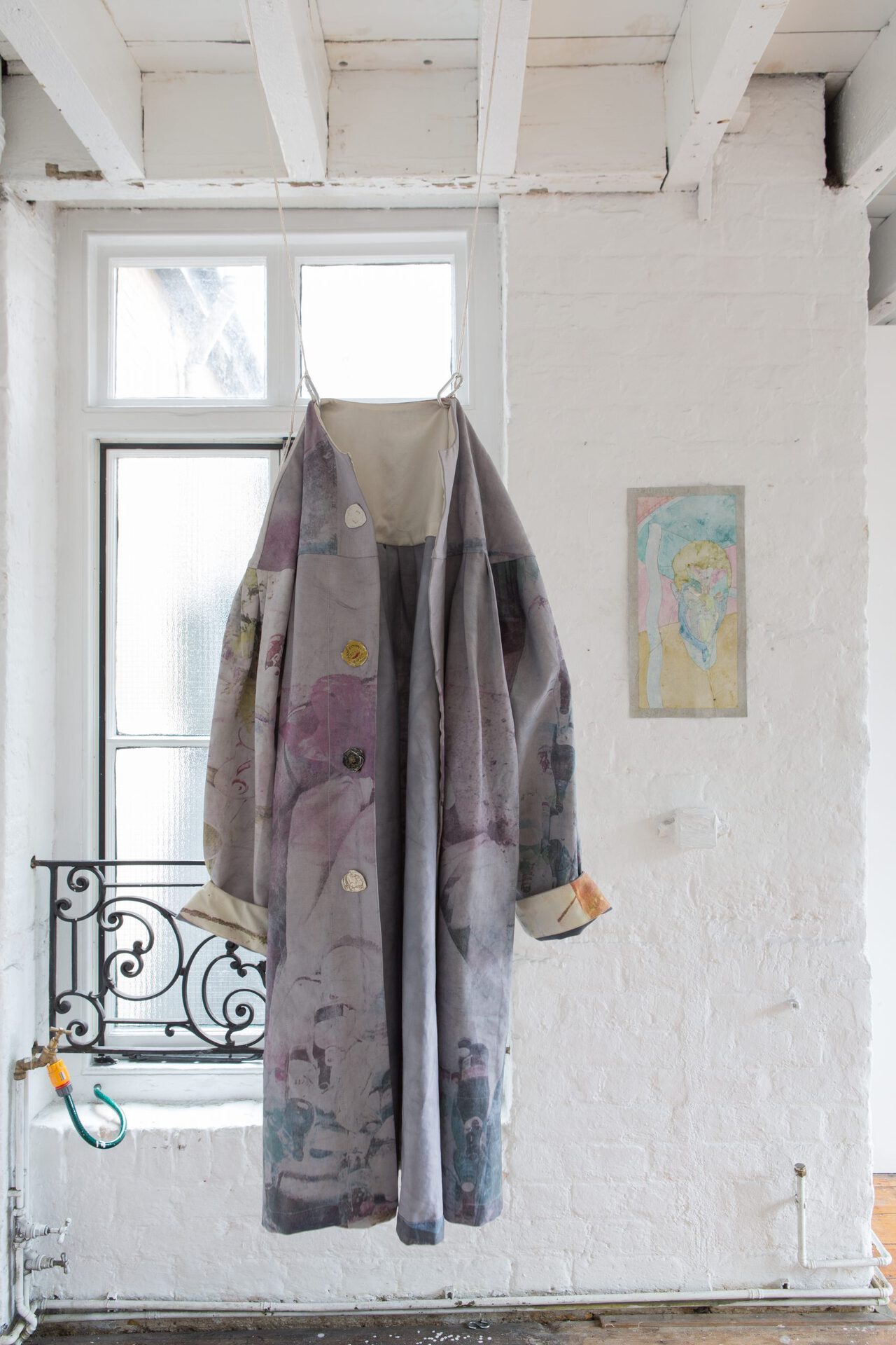 Katie Shannon and Celia Phillips, Ladies drinker’s smock, 2022, screen print on fabric, 96x20x30 cm