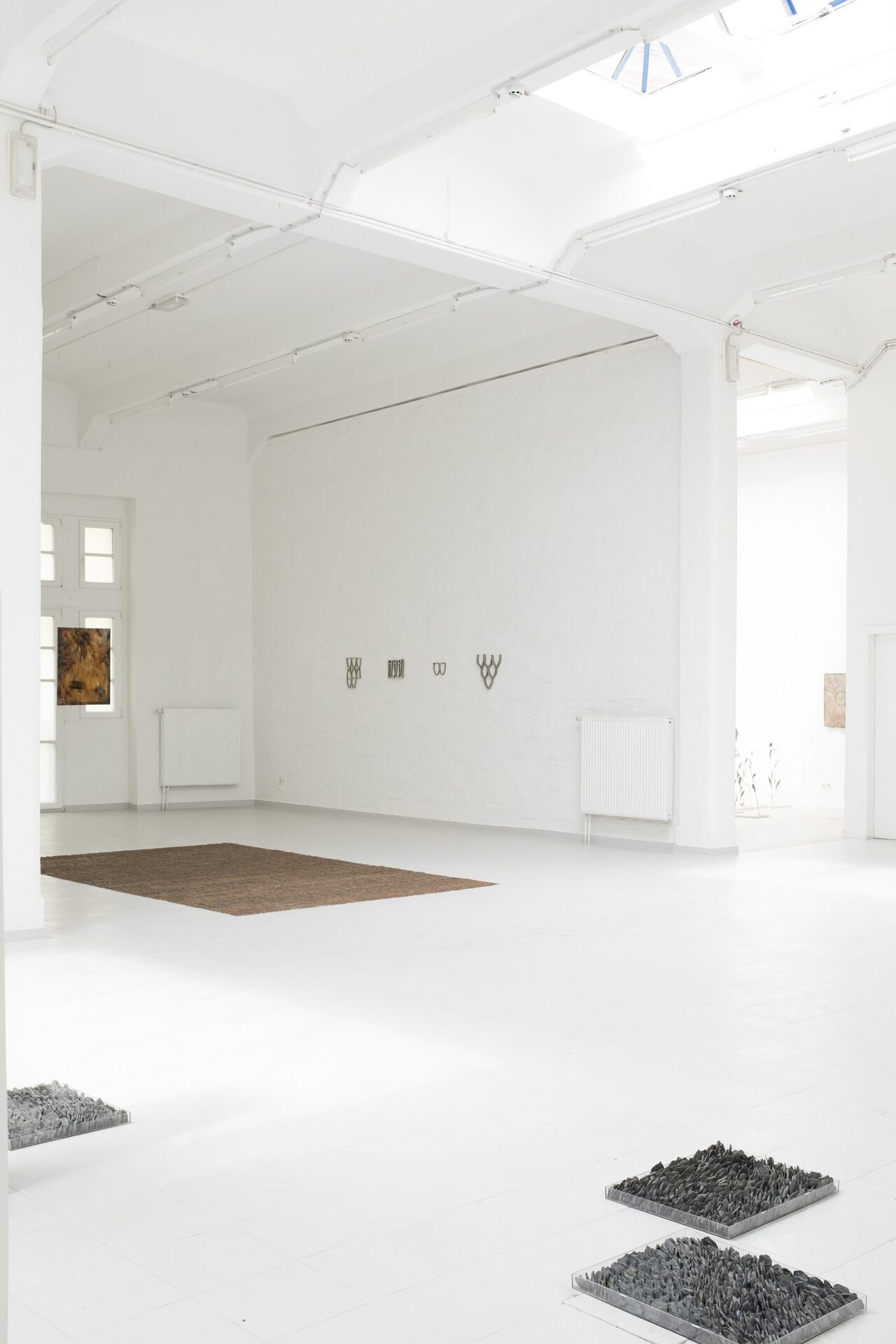 Exhibition View, in front, Katharina Gahlert, Talking to Stones, 2021, Acrylic glass boxes, stones, 60 x 50 cm