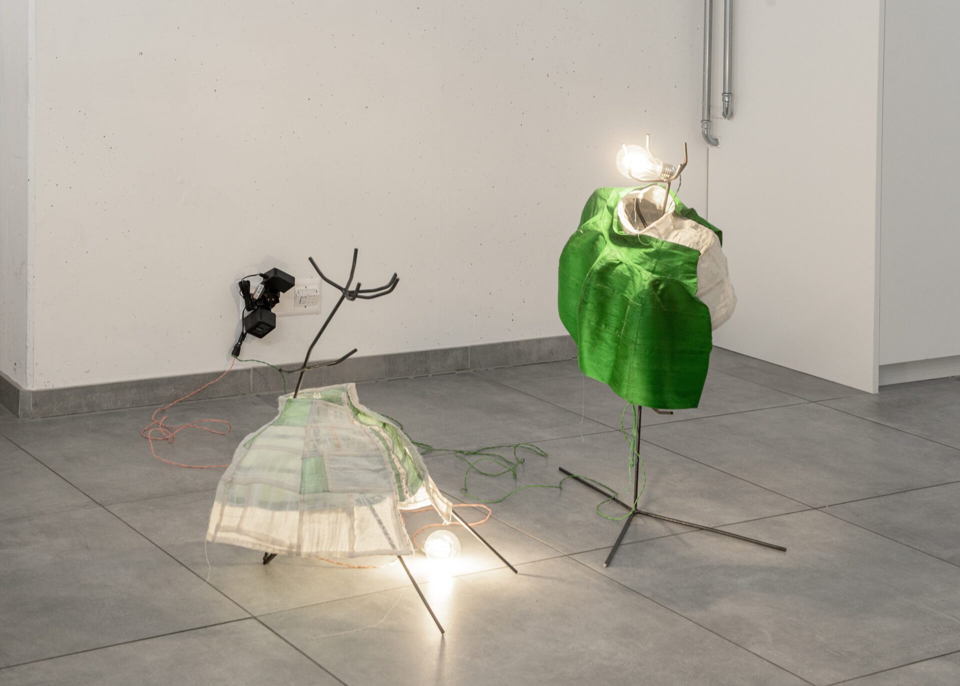 Karolin Braegger, Low-Slung Dress, 2022 and Actress I (Lamp), 2020 lightbulb, textile, steel, wire, electricity