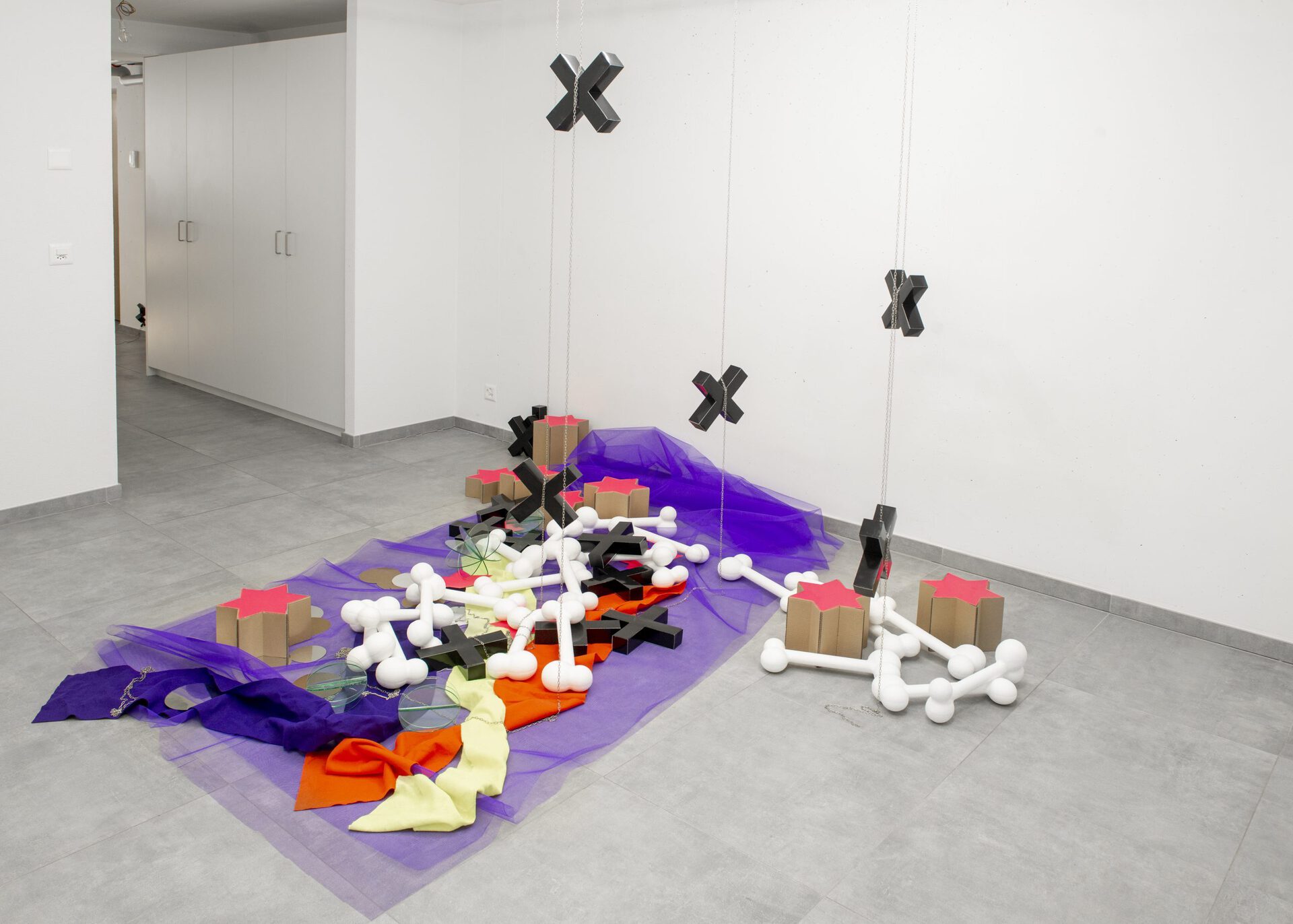 Delphine Coindet, Vide poche, 2005 polystyrene, paper, cardboard, plexiglas, felt and metal chains