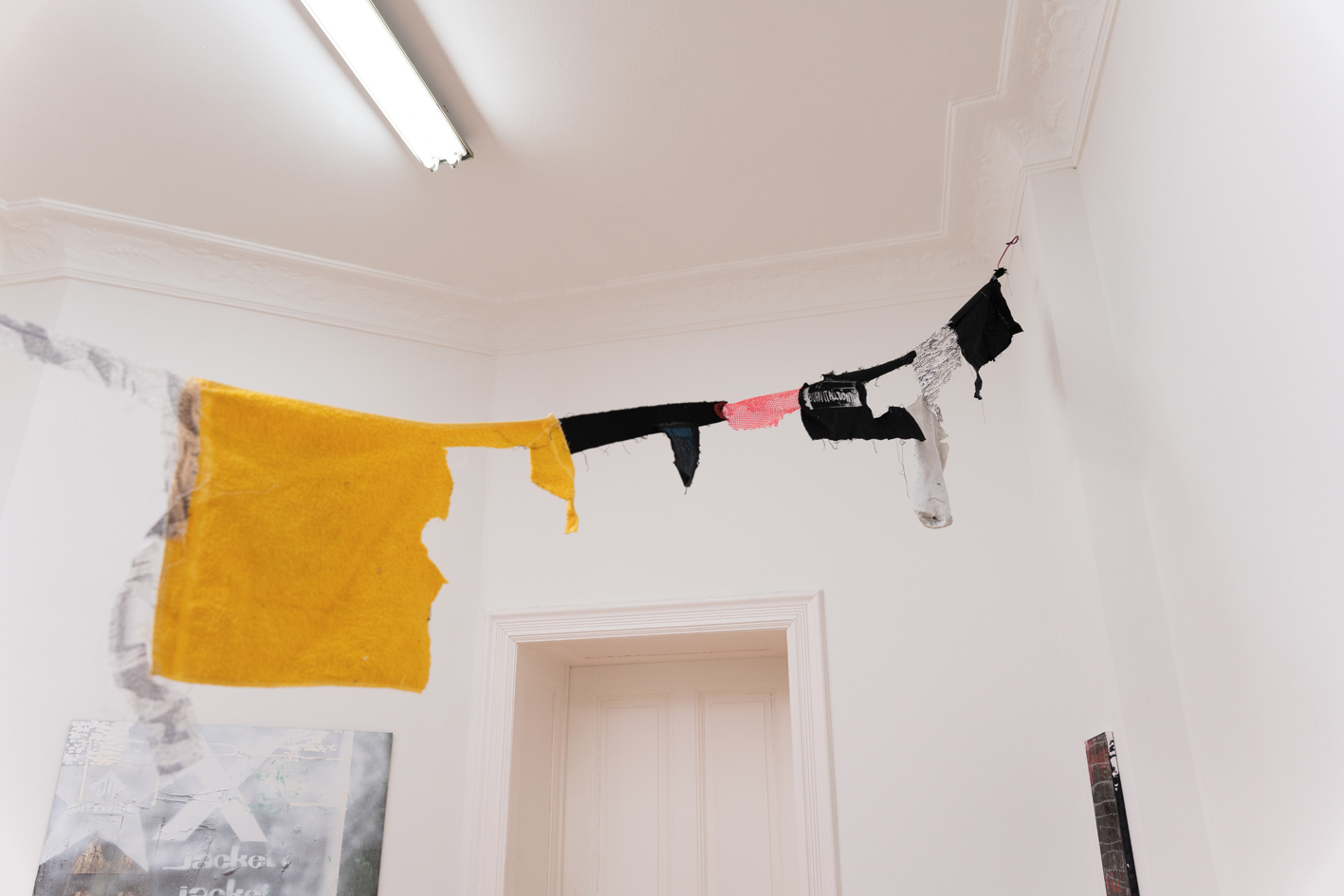 Jake Kent, Clown Ephemera pt. 2, Screen printed patches, hair, ceramic, and found materials, Detail view 1, 2021-ongoing