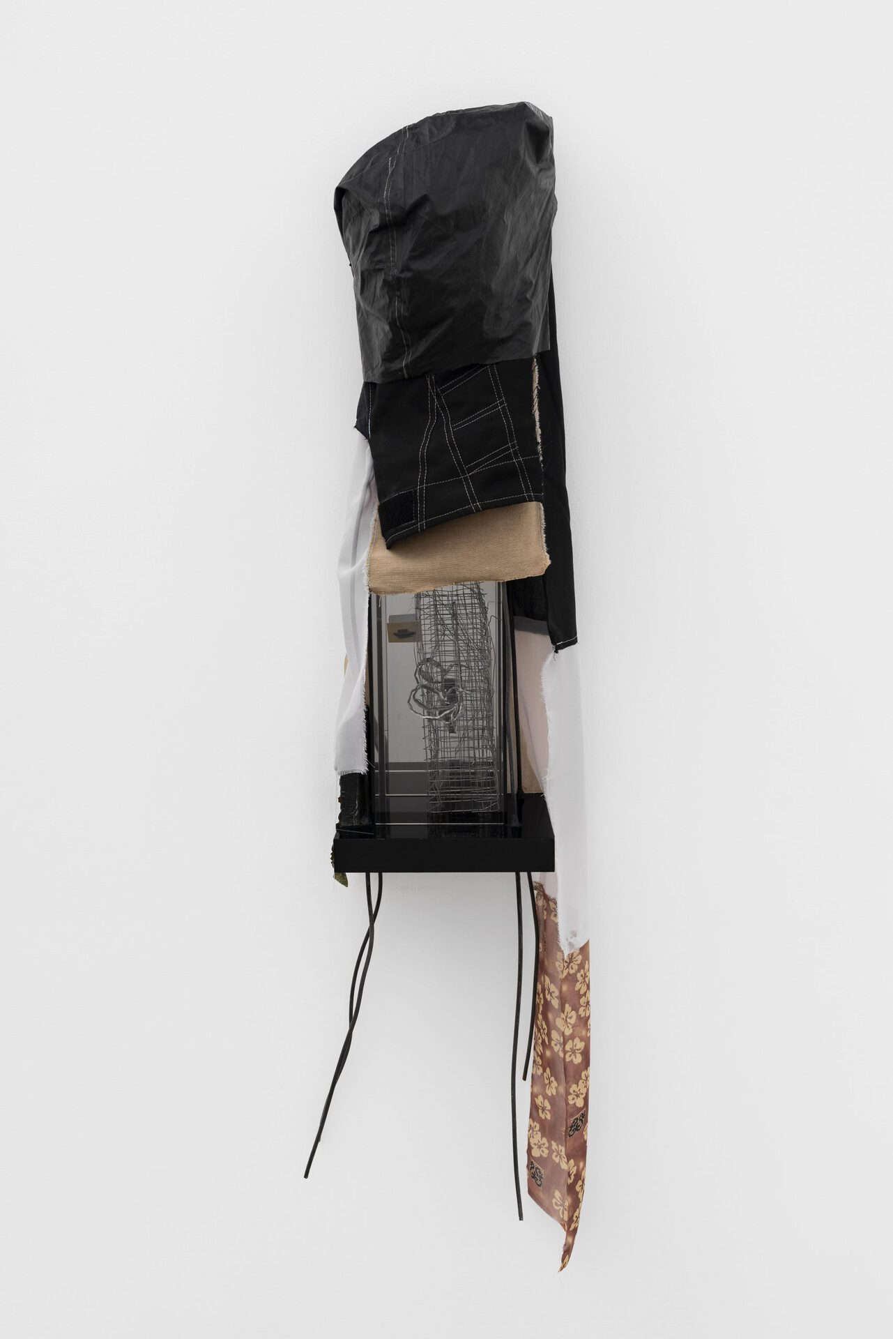 Ania Bąk, Clothed Tower, 2022 hdf board, steel, glass, textiles, plant fragments, paint, battery, magnet, 130 x 35 x 25 cm