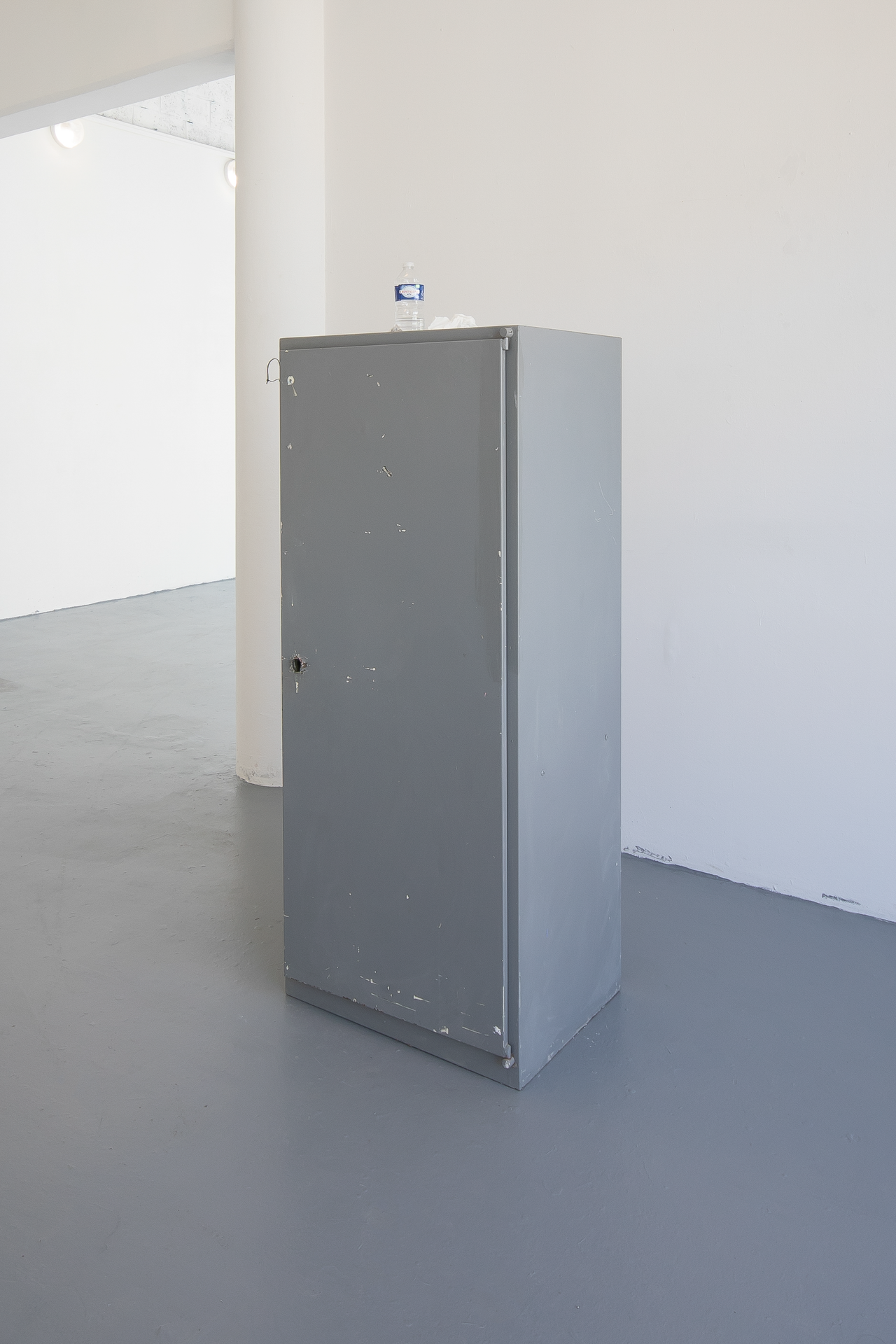 Hugo Bausch Belbachir, Untitled (Cabinet), Metal cabinet, water bottle, tissues, paper, 146 x 60 x 45 cm, 57 1/2 x 23 5/8 x 17 3/4 inches.