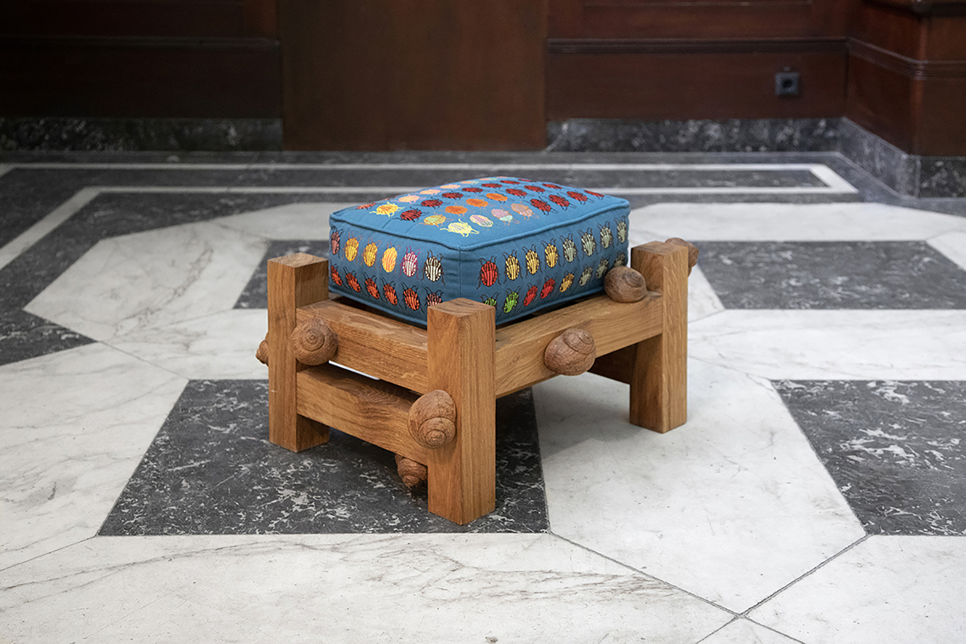 Daniel Dewar &amp; Grégory Gicquel, Oak bench with striped shield bugs and snails, 2021, oak wood and embroidery on cushion, 41 x 66 x 56 cm