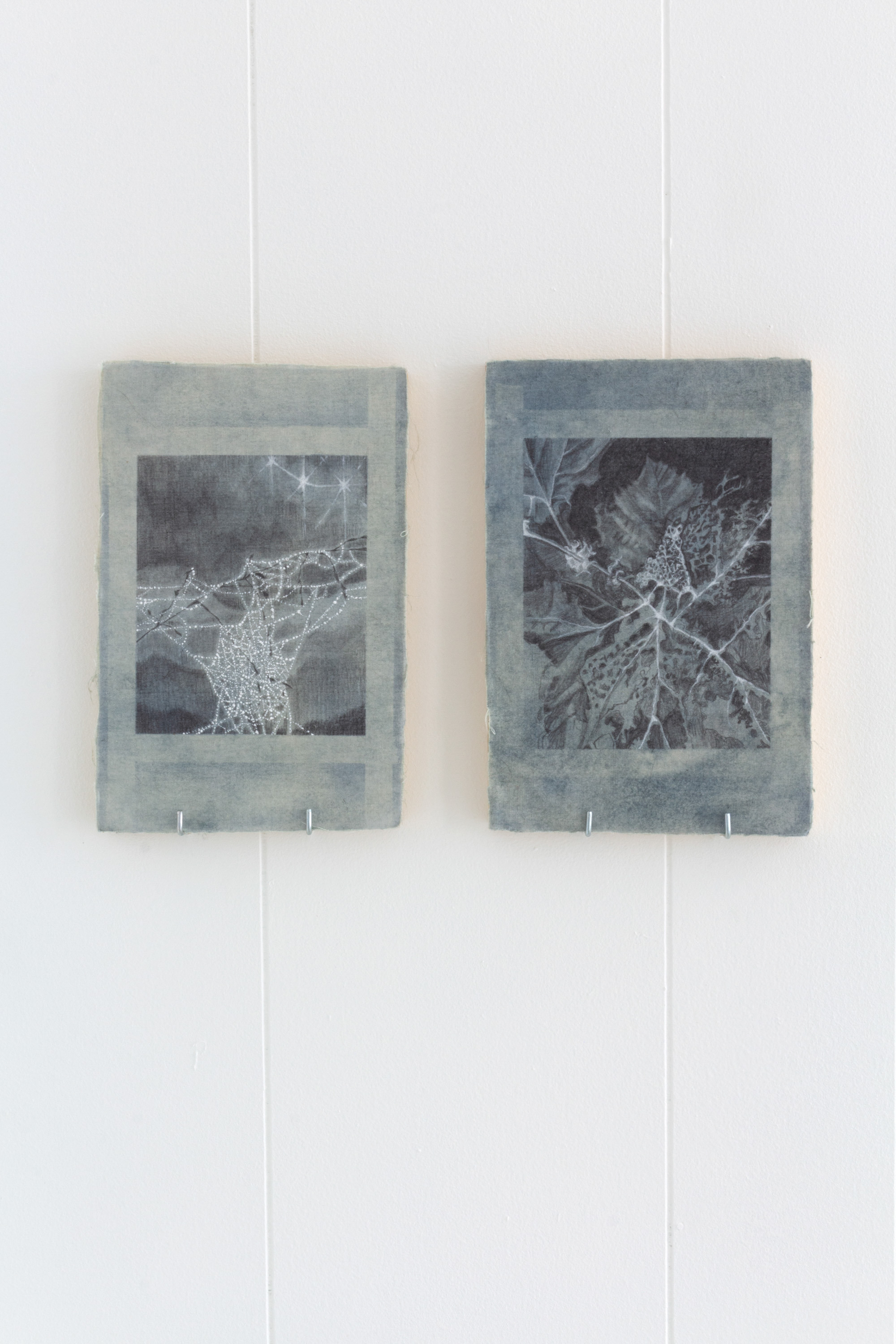 Ash Galka, river leaf study, 2022; spiderweb early early morning, 2022, Indigo dyed cotton and graphite on panel, 5.5 x 8 in each