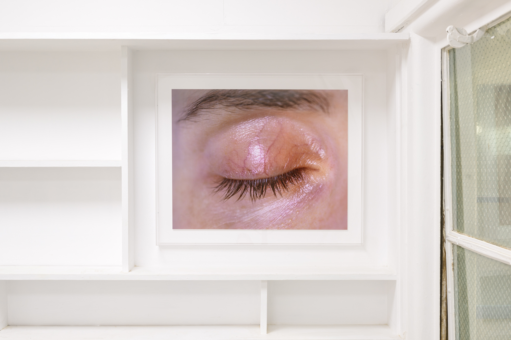 Red-Eye, 2022. C-type print on Fuji Lustre, acrylic box frame. 