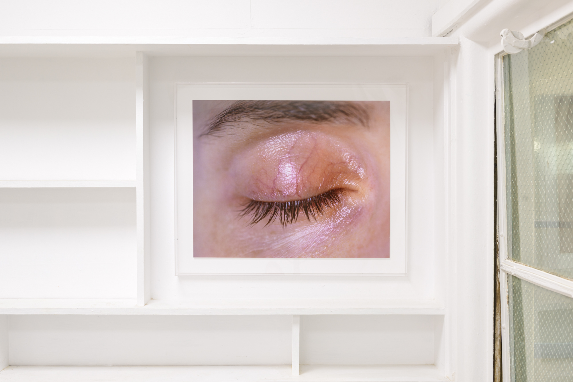 Red-Eye, 2022. C-type print on Fuji Lustre, acrylic box frame.