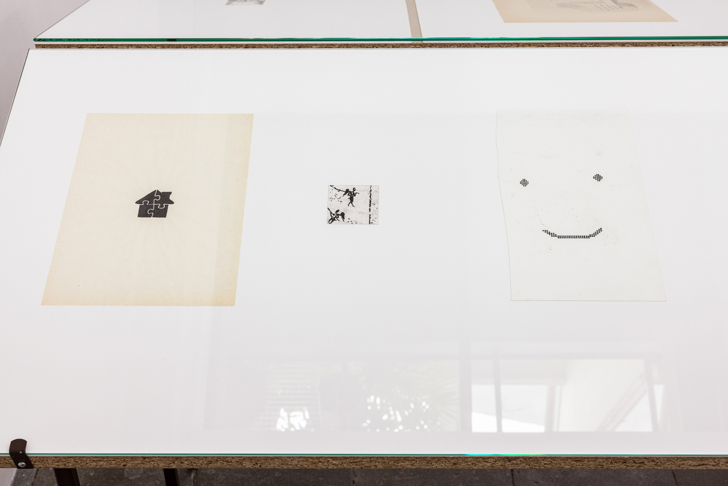 Maxime Le Bon, On the left: Puzzle, 2020, ink on paper, 21 x 29,7 cm In the middle: Demons, 2022, oil and graphit on paper, 6 x 6 cm On the right: :) , 2021, oil on paper, 17 x 30 cm