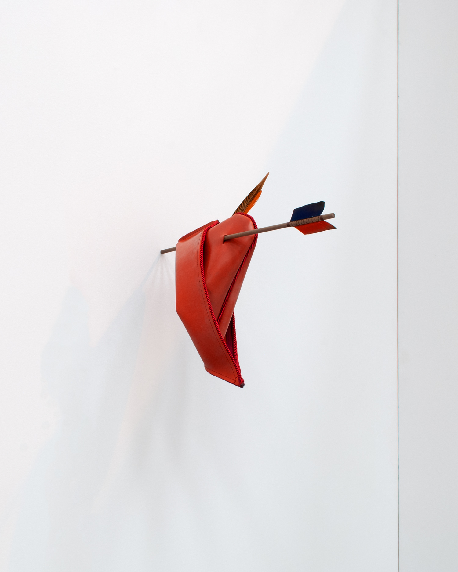 We never rob! We just simply borrow a bit from those who can afford it, 2022, Rubber, twisted cord, walnut wood, feathers, 40x20x50cm