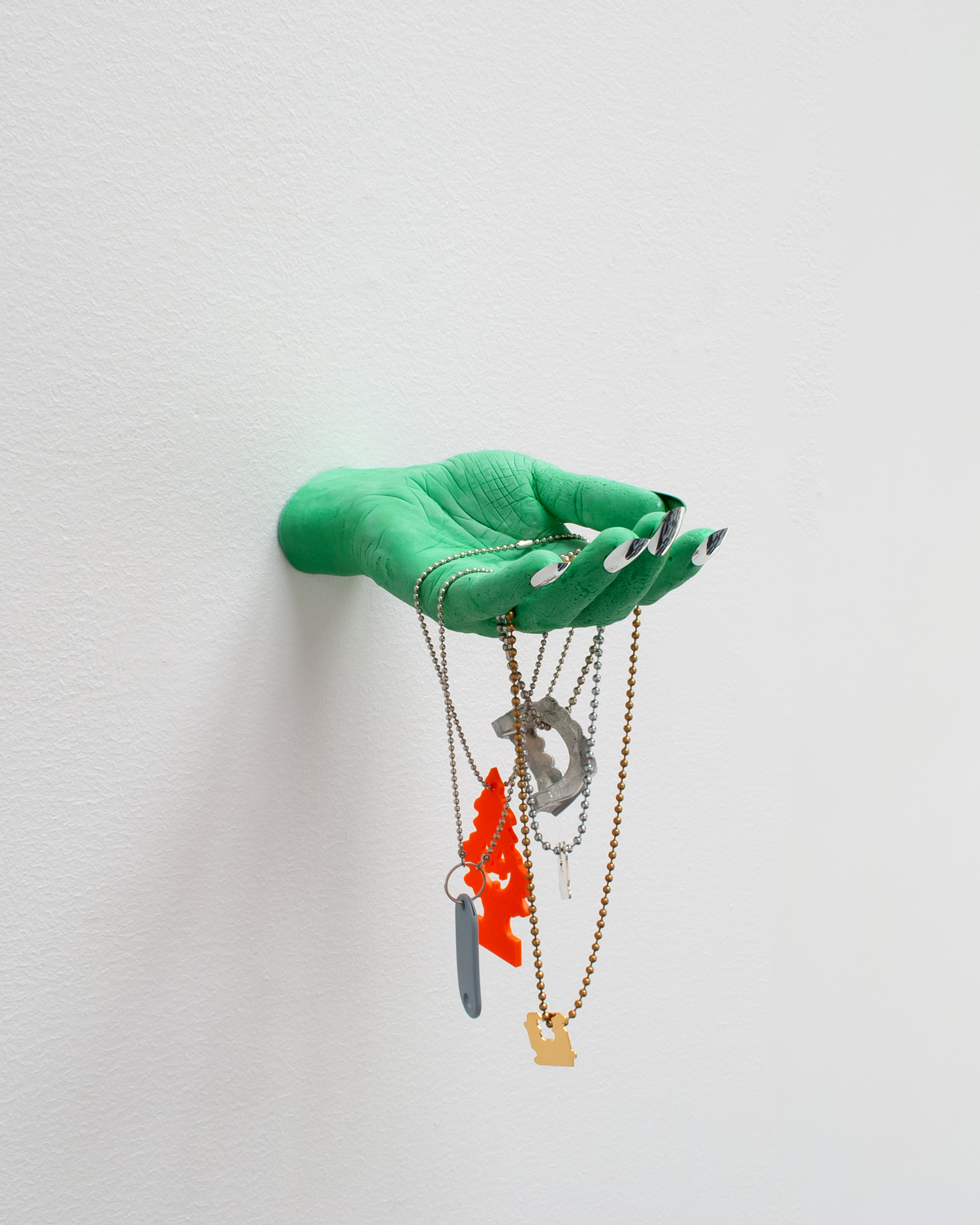 Souvenirs, 2022, Polyurethane, acrylic nails, brass ball chain, aluminum, perspex, 24k gold plated steel, silver plated steel, Dragon Ball Z card, key chain, Dimensions variable