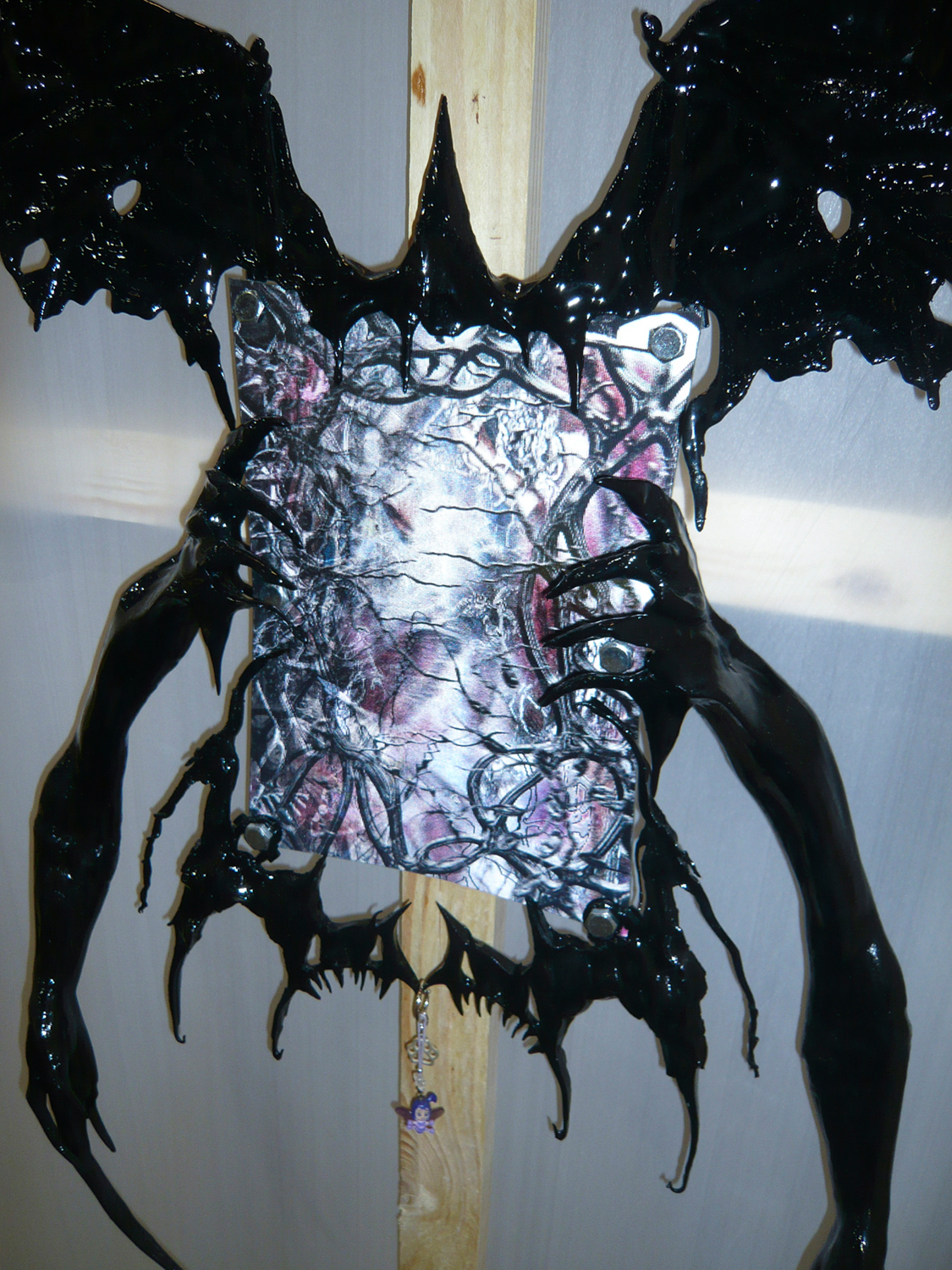 Mutant, 2022, lenticular print and epoxy-coated ornaments