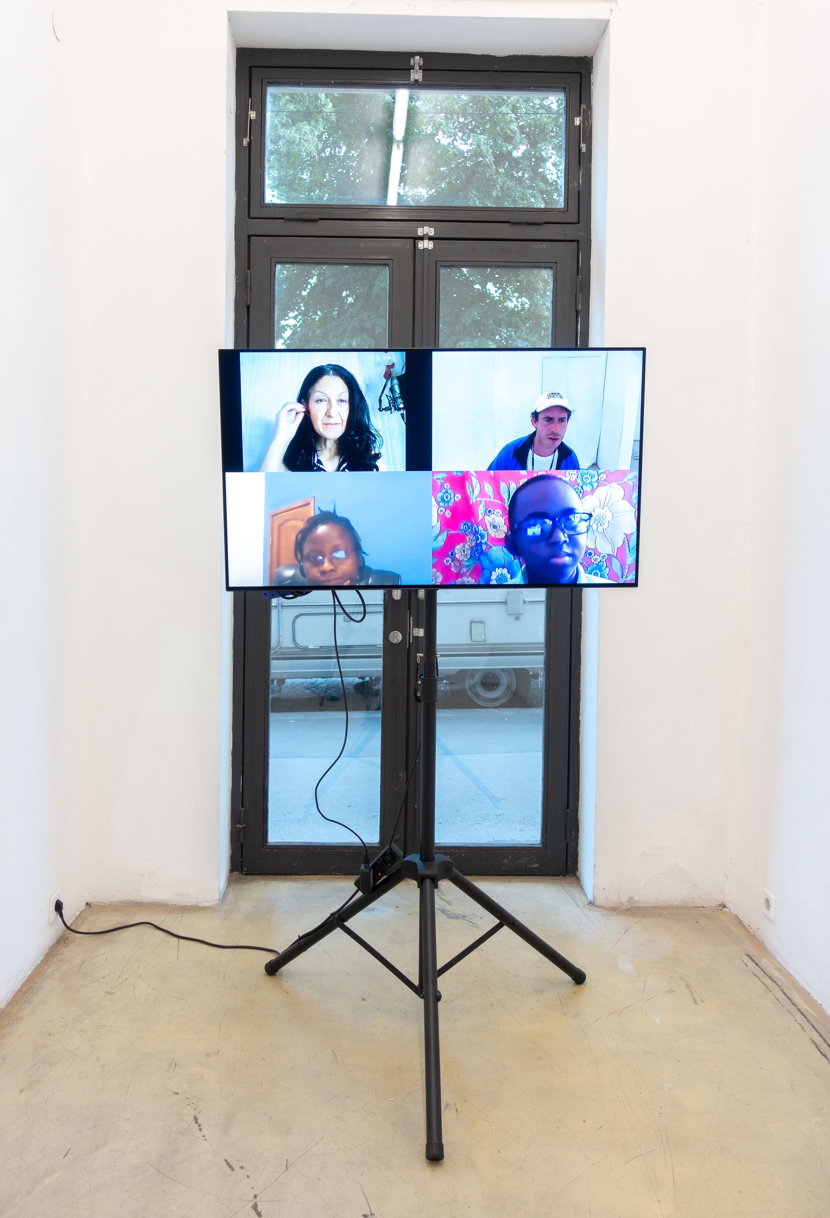 Nicolas Cilins, Talk to me!, 2021– , Digital performance, on-demand workers, HD monitor on stand, conference hardware and software