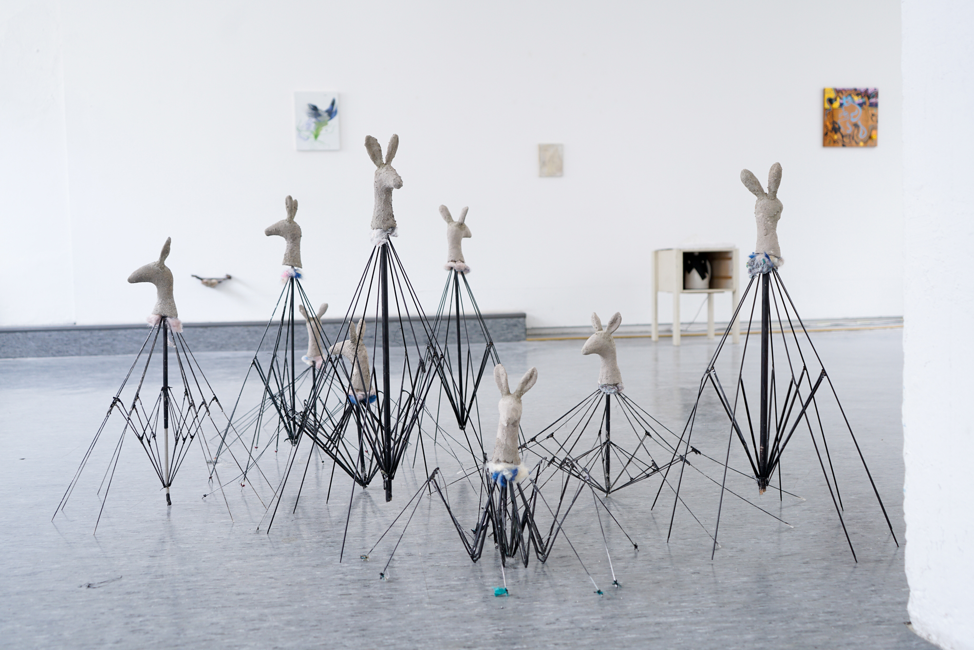 Pawel Marcinek, Common Horizon, 2022, mixed media installation: umbrella wires, plaster, ashes, dust