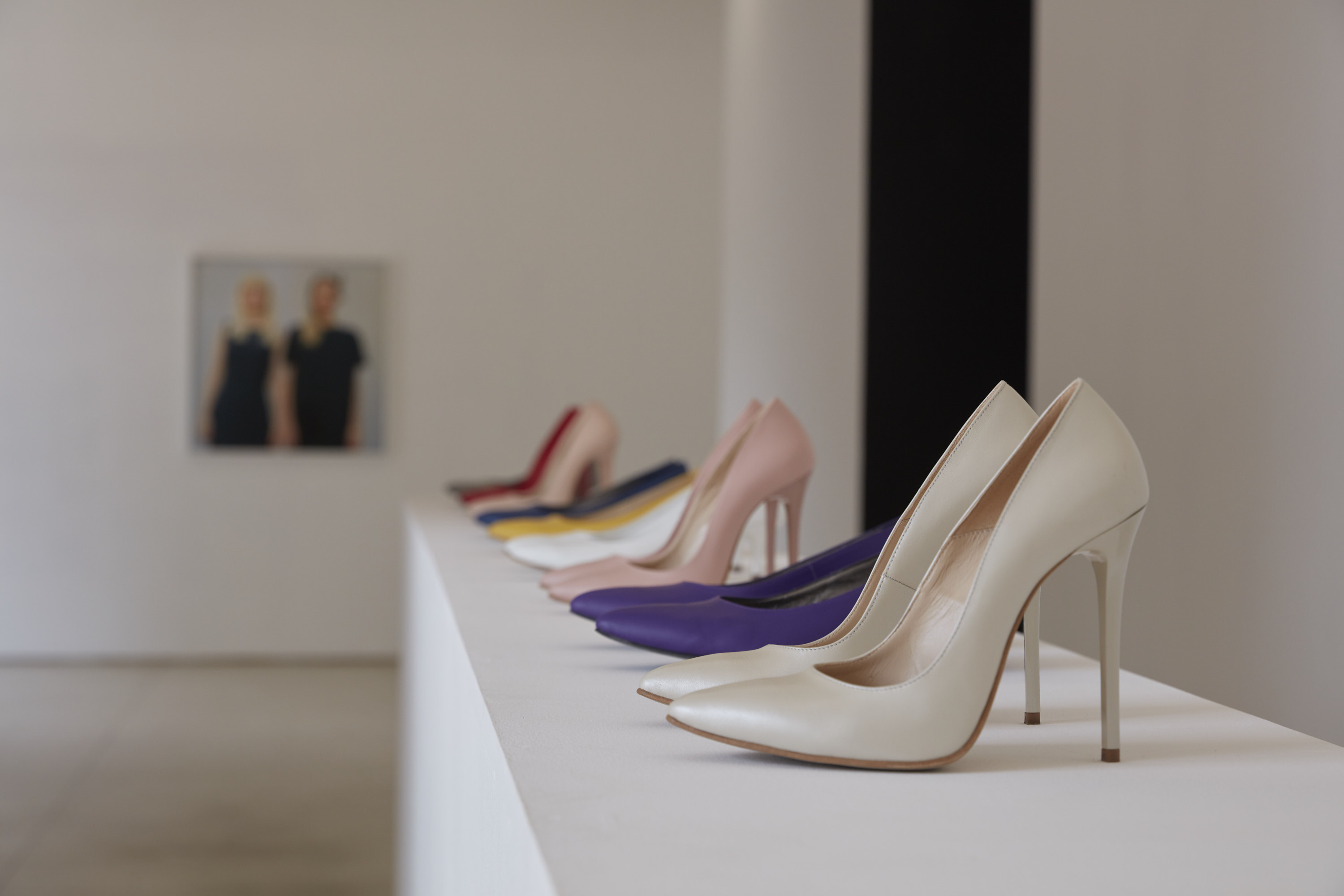 The Bureau of Melodramatic Research, High Heel Communism (installation), 2022, 9 pairs of high-heel shoes, 400 x 40 x 110 cm 
