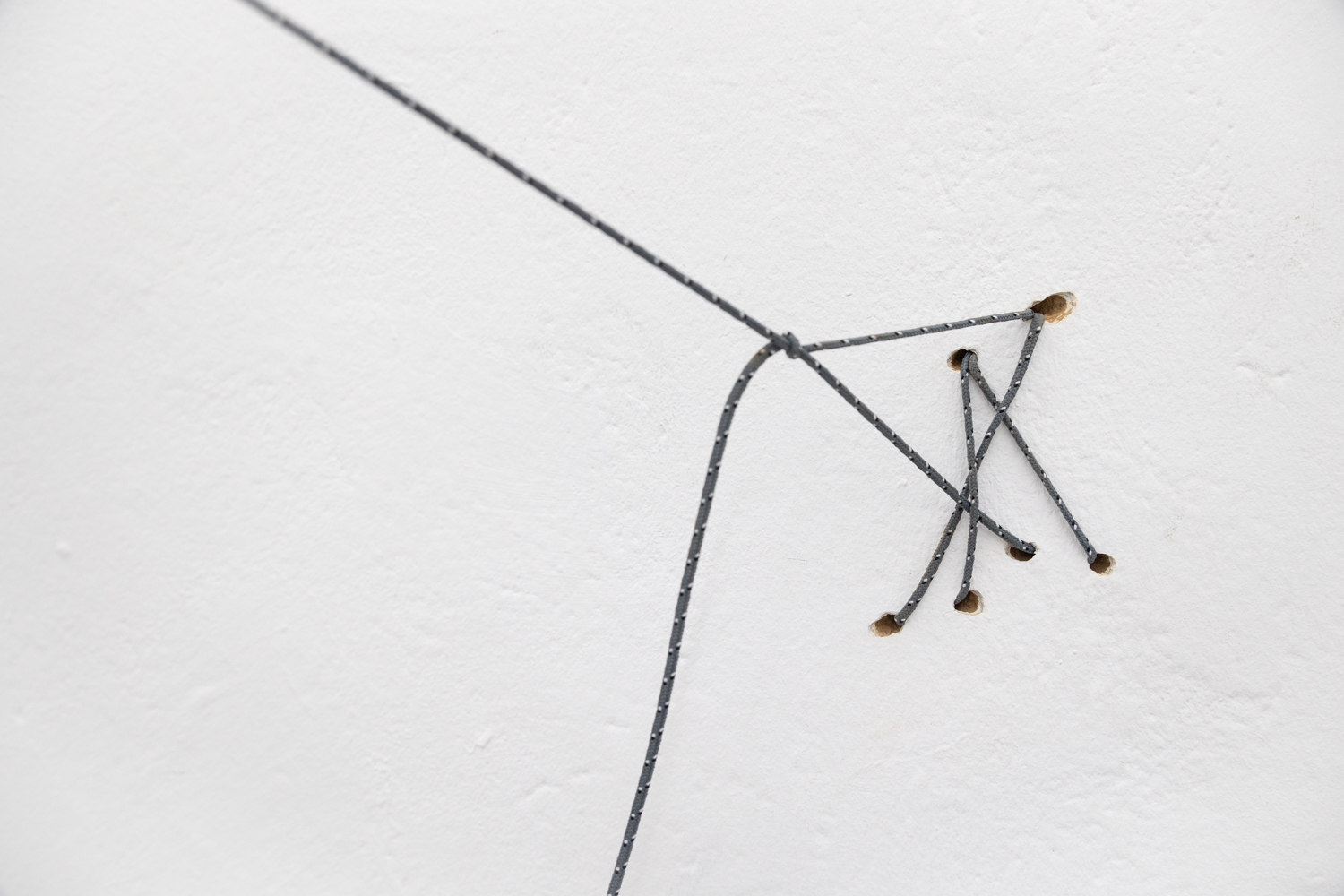Tanat Teeradakorn & Joe Highton GEOMETRY OF THE DELUSIONAL LAYER ON THE BONE, Dye-sublimation print on fabric, metal, ropes, rocks; 2m x 2m 2022