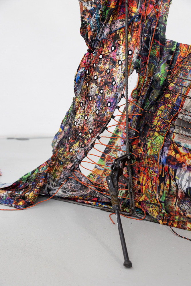 Tanat Teeradakorn & Joe Highton GEOMETRY OF THE DELUSIONAL LAYER ON THE BONE, Dye-sublimation print on fabric, metal, ropes, rocks; 2m x 2m 2022