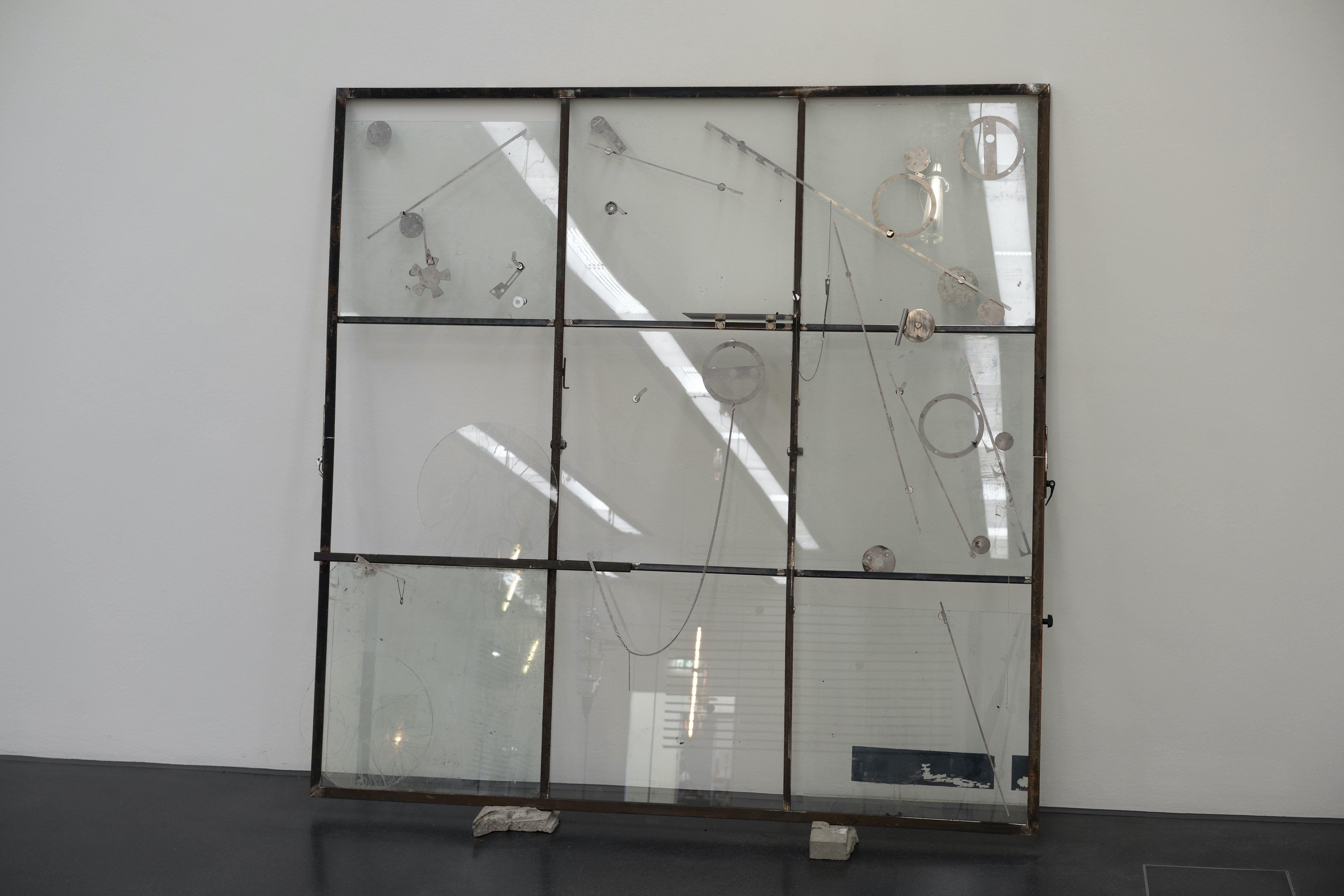 Collector (window drawing) 2022 Steel, glass, magnets, concrete 200 Ã— 200 cm
