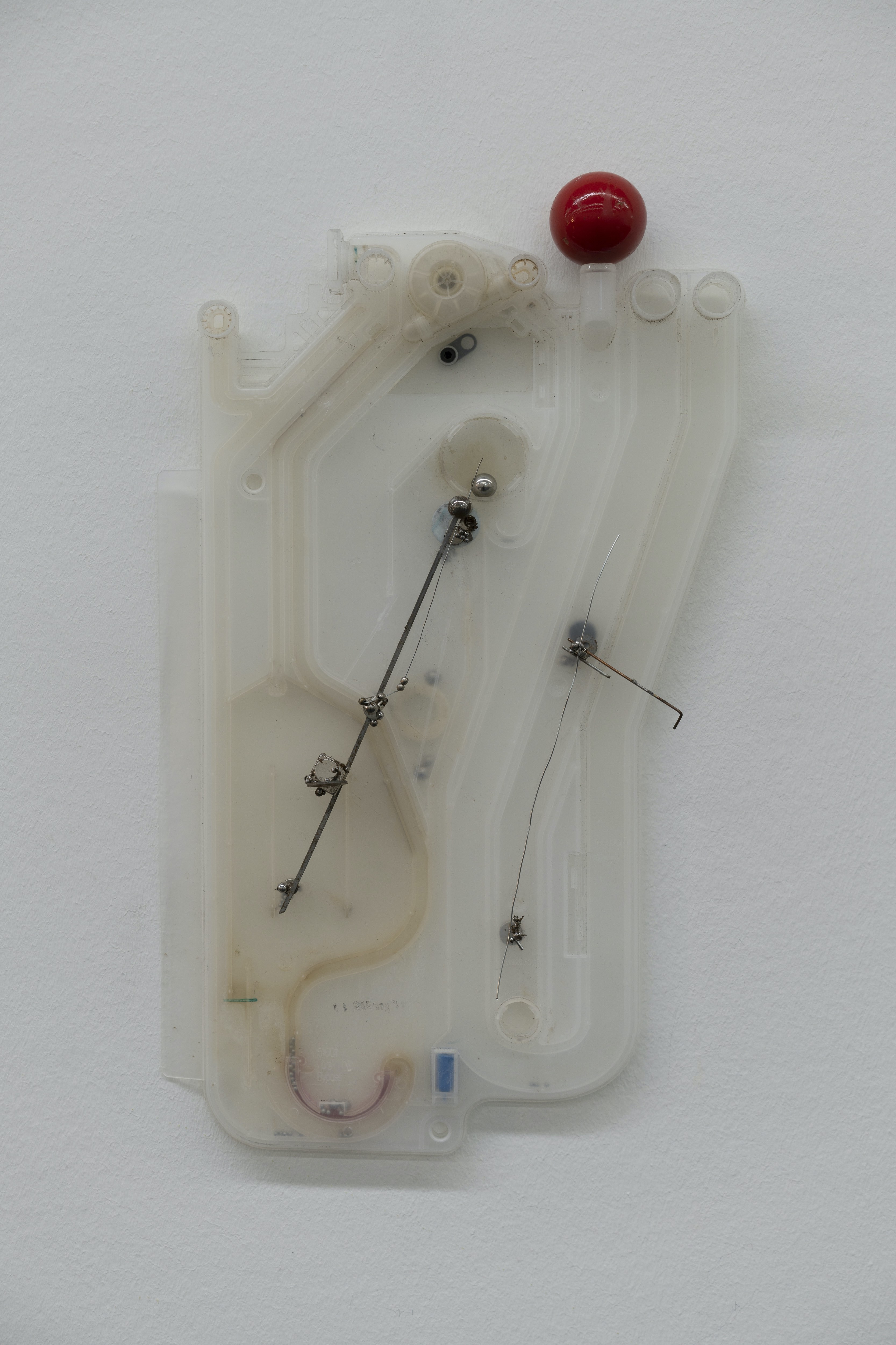 Switchboard III 2022 Wooden ball, aluminum, metal rings, steel balls, plastic Approx. 80 × 40 cm