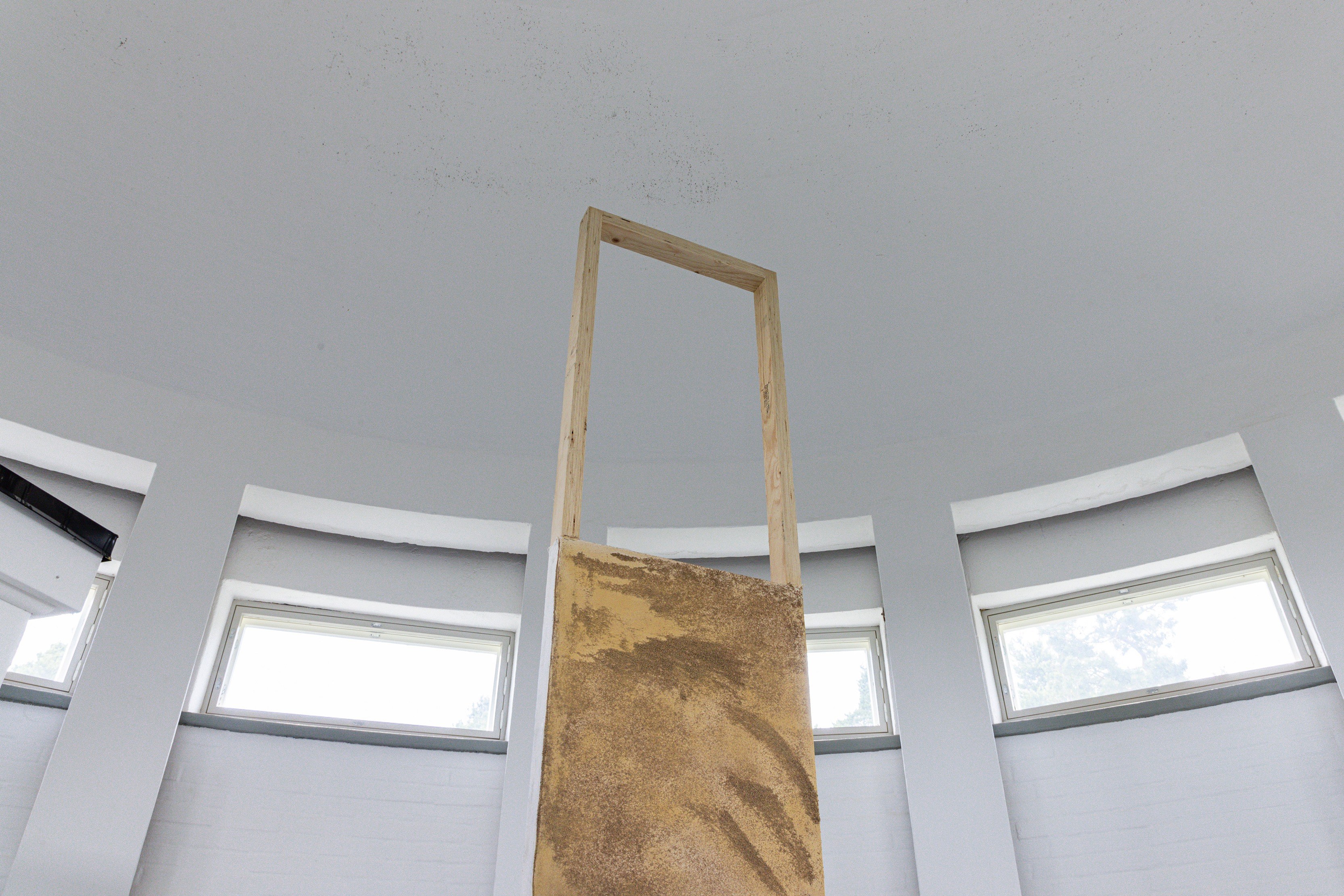 Emelie Luostarinen: 16 million *****, 2022; Canvas, sand (hanko beach), wood, stand oil, oil paint, spray paint, perforated plates and necklace;  360 x 360 x 60 cm 