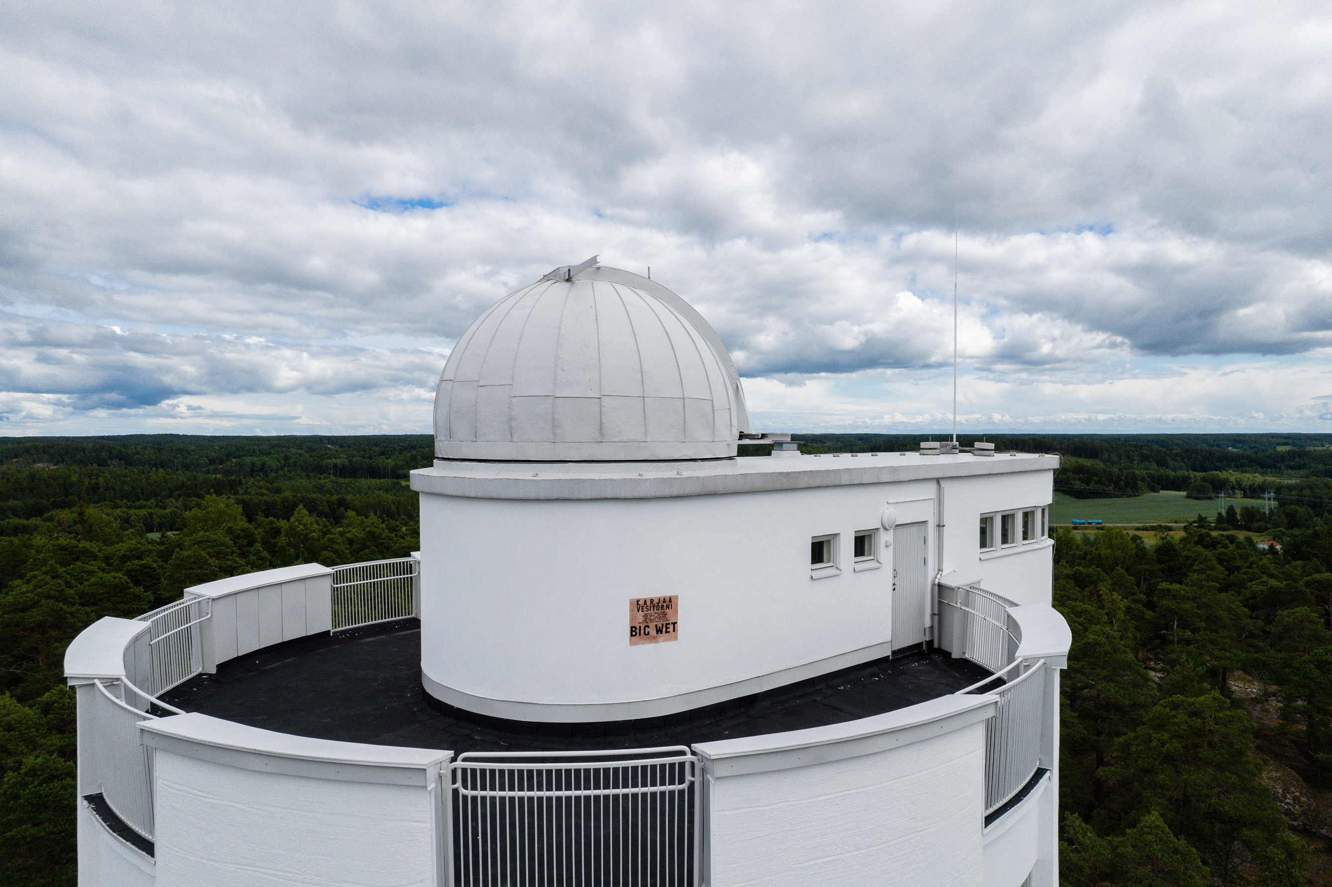 Jessie Bullivant: LIL WET, 2022; watercolour painting on exterior wall;  Schmincke Horadam Aquarell – Mars Brown, White Nights Watercolour – Neutral Black, water from Dagmar's spring; 500 x 570mm; Special thanks to Lari Mörö & Mikko Kuorinki