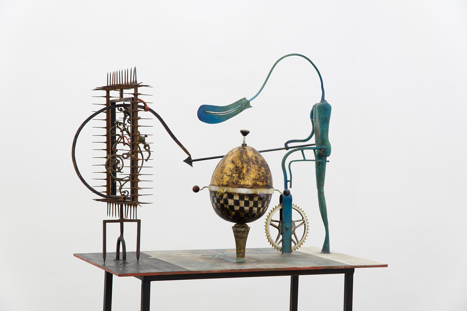 Bogdan Breza, "Masa de Joc" (The Game Table), wood, iron, ready-made objects, acrylic, 2021