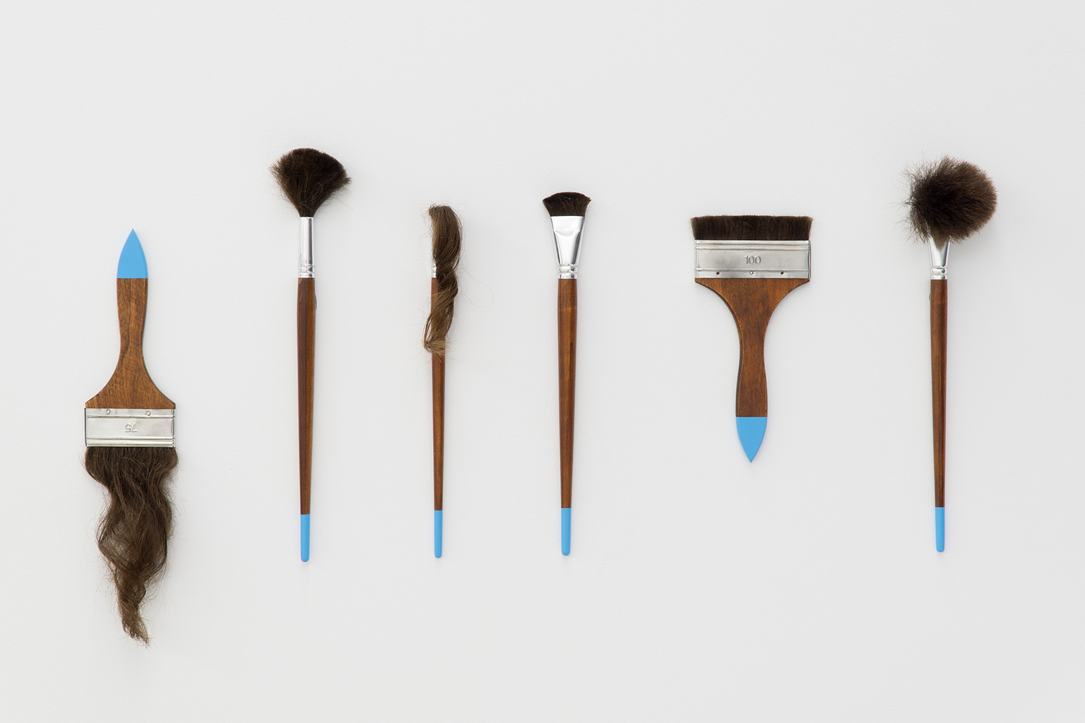 Alexandru Mihai Budeș, "artist’s hair brushes", modified brushes, human hair, various dimensions, 2022