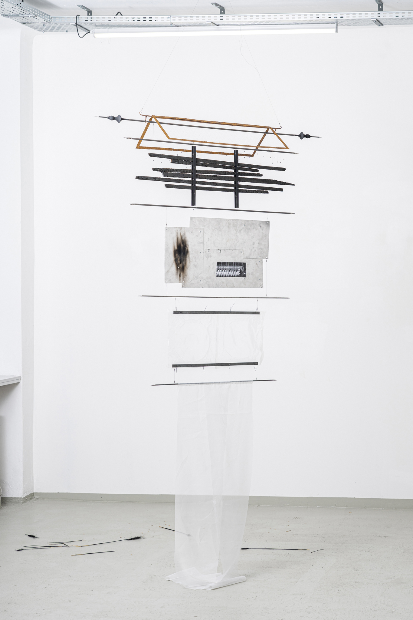 René Stiegler,  U-31, 2022, 235 x 120 x 36 cm, Steel Bars, Hair, Lead, PLA, Paint, Burned Wood, Aluminum, B&W Printing, Polypropylene, Nylon