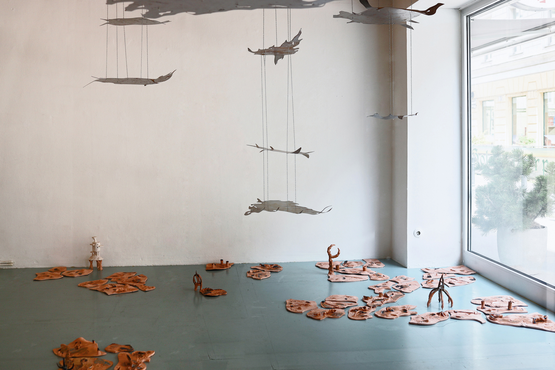 Anna Bochkova, Just Around The Cosmos, 2022, ceramics, steel, chains, diverse dimension, installation view
