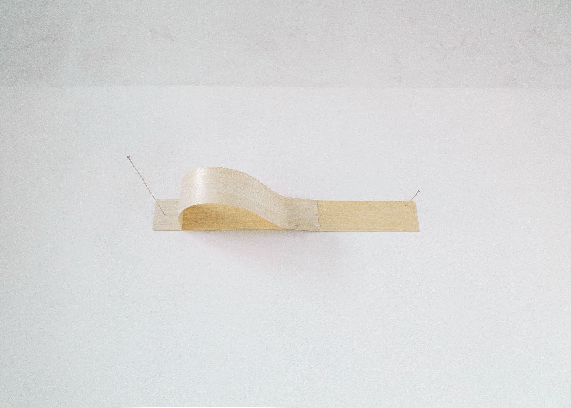 Marlene Leonie Posch, back-bend, 2022, sterling silver, wood veneers, 55 Ă 10 Ă 53 cm