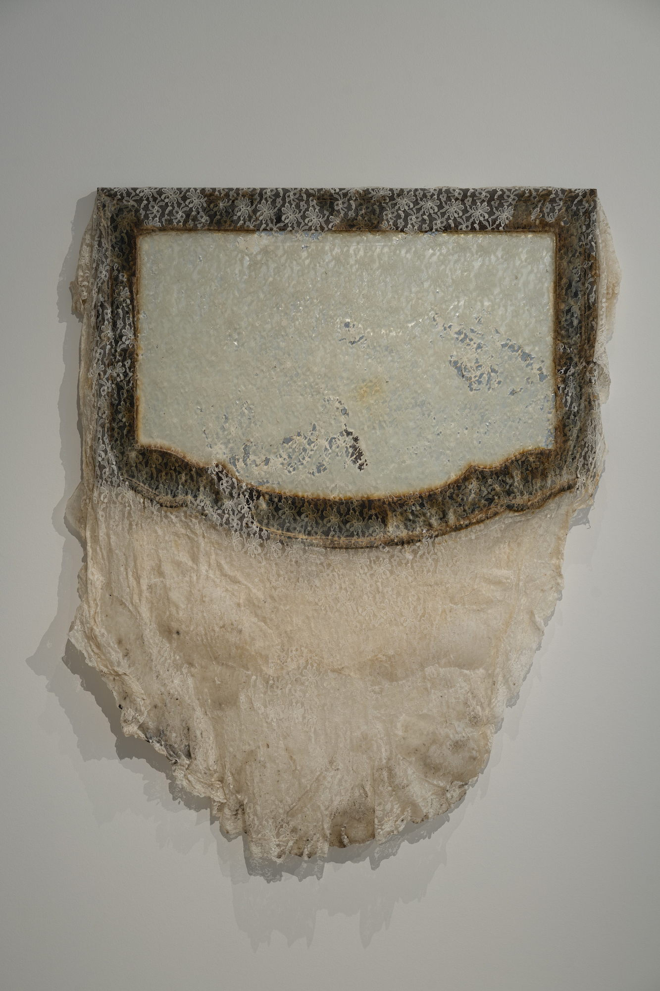 Bri Williams, Rejection, 2021, Lace table cloth, soap, mirror, 85 x 100 x 6 cm,  Courtesy of the artist