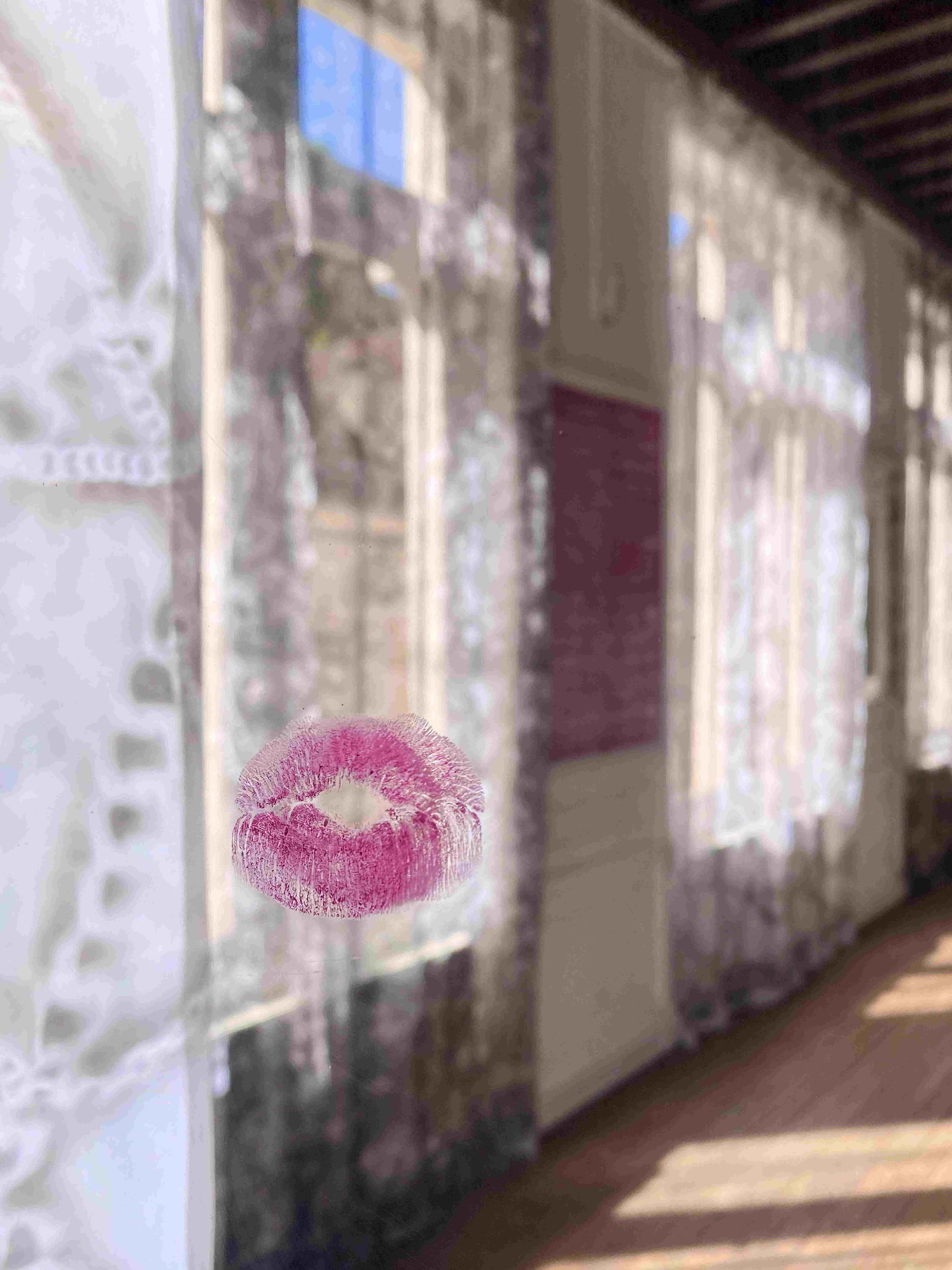 Kiss Me Hard Before You Go, (detail),  2022, lipstick on mirror, 130 x 38 cm