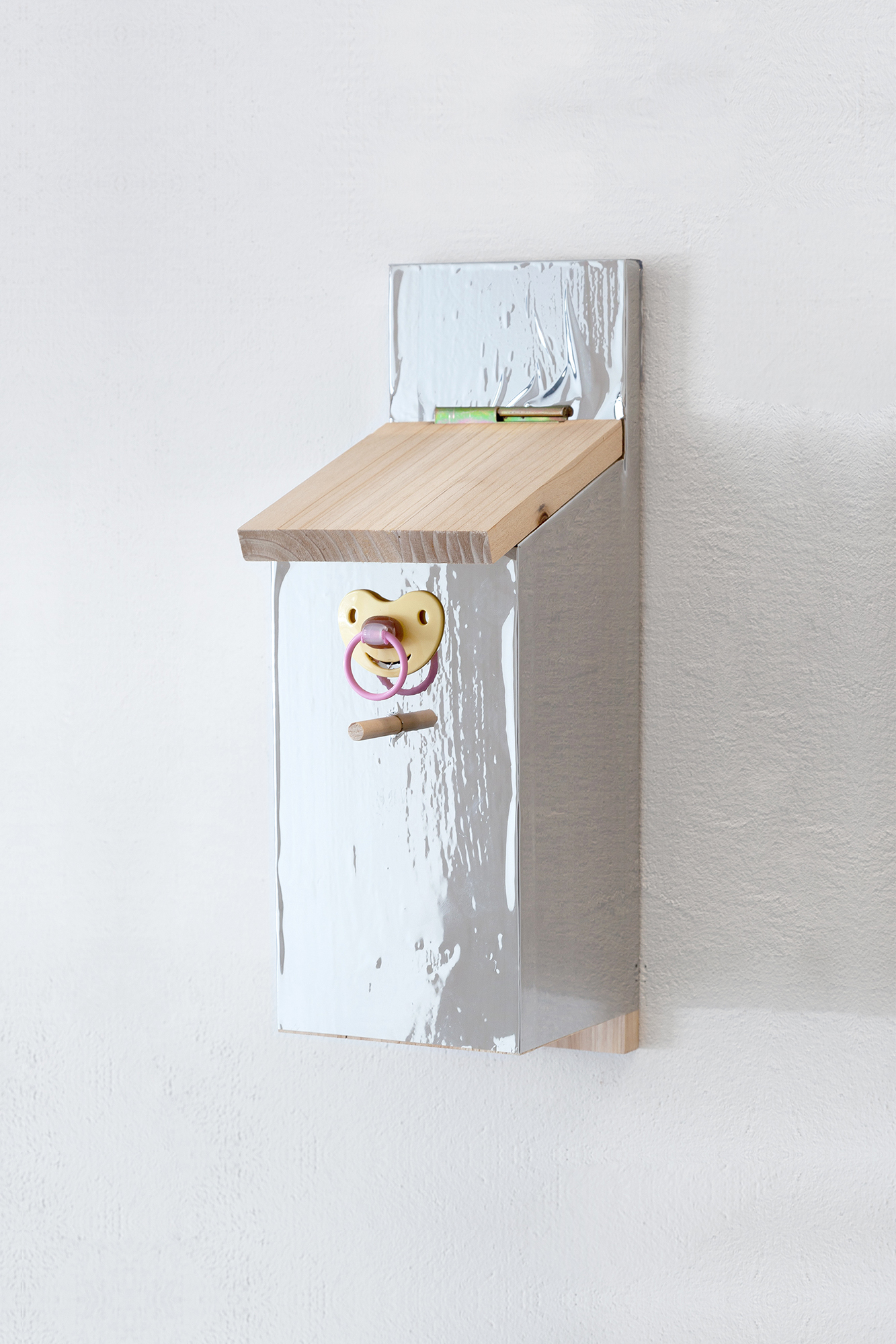 11. Paula Linke, Women like birds, birds like mirrors (I), Wood, mirror foil, pacifier, 2022