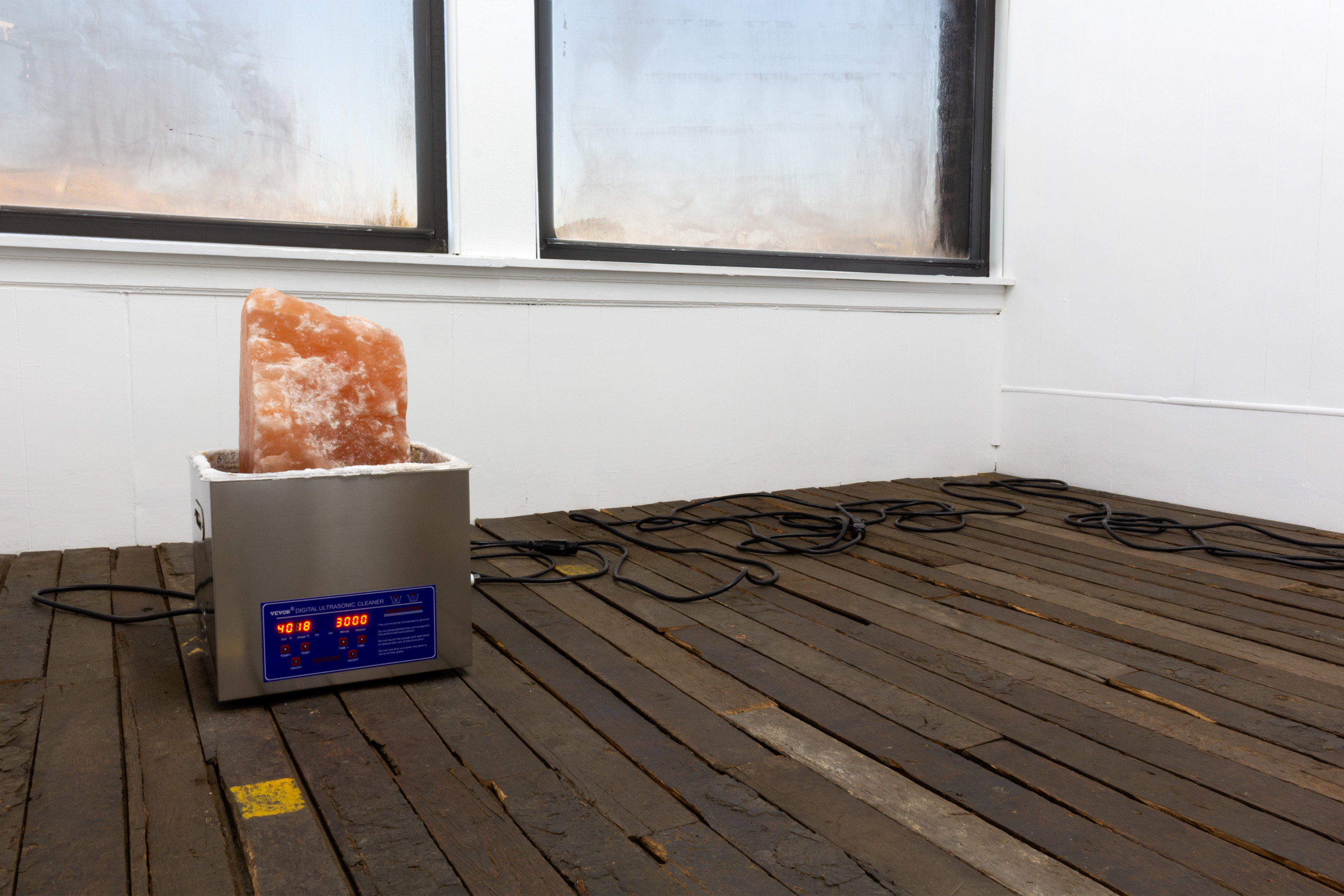 Graham Wiebe, Study for a Water Burial, 2022, Ultrasonic cleaner, water, salt rock, extension cord, 12.5 x 10.5 x 20 in