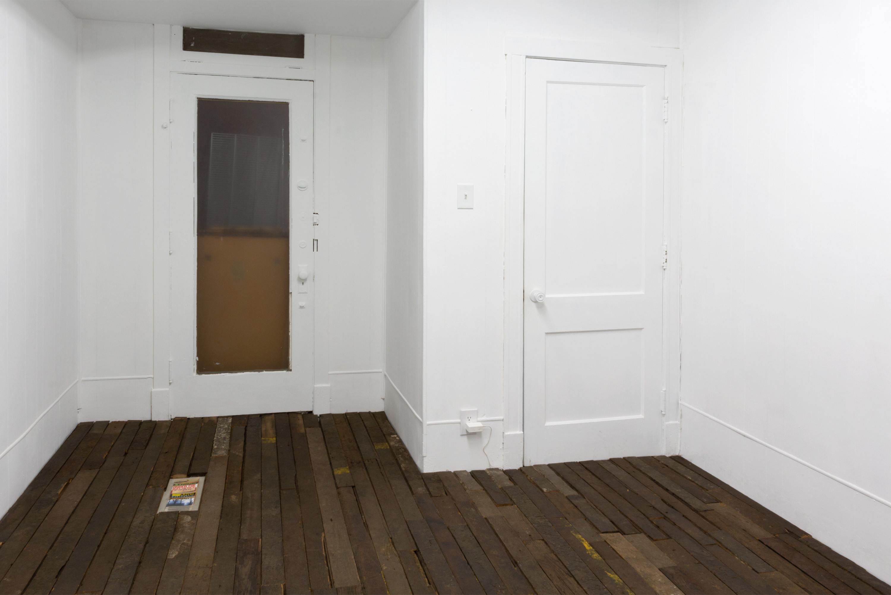Installation view / Graham Wiebe, Cosplay, 2022, Salvaged coffin factory flooring, Dimensions variable