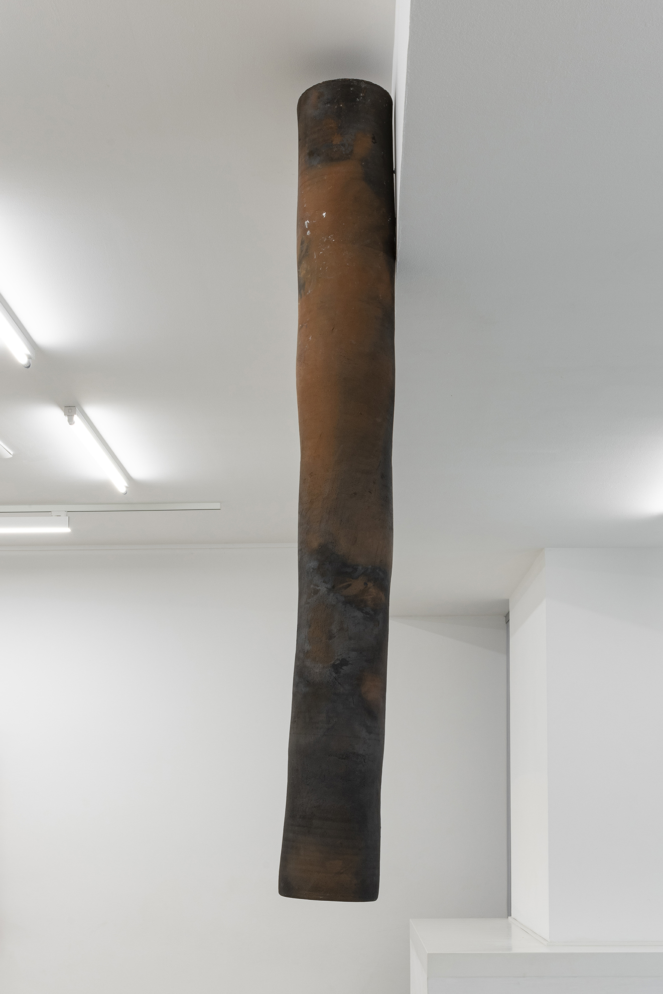  Bodies rest. It descends and combines with water, Joana Escoval, 2022, earth, water, fire, air, 168 x 20 cm.