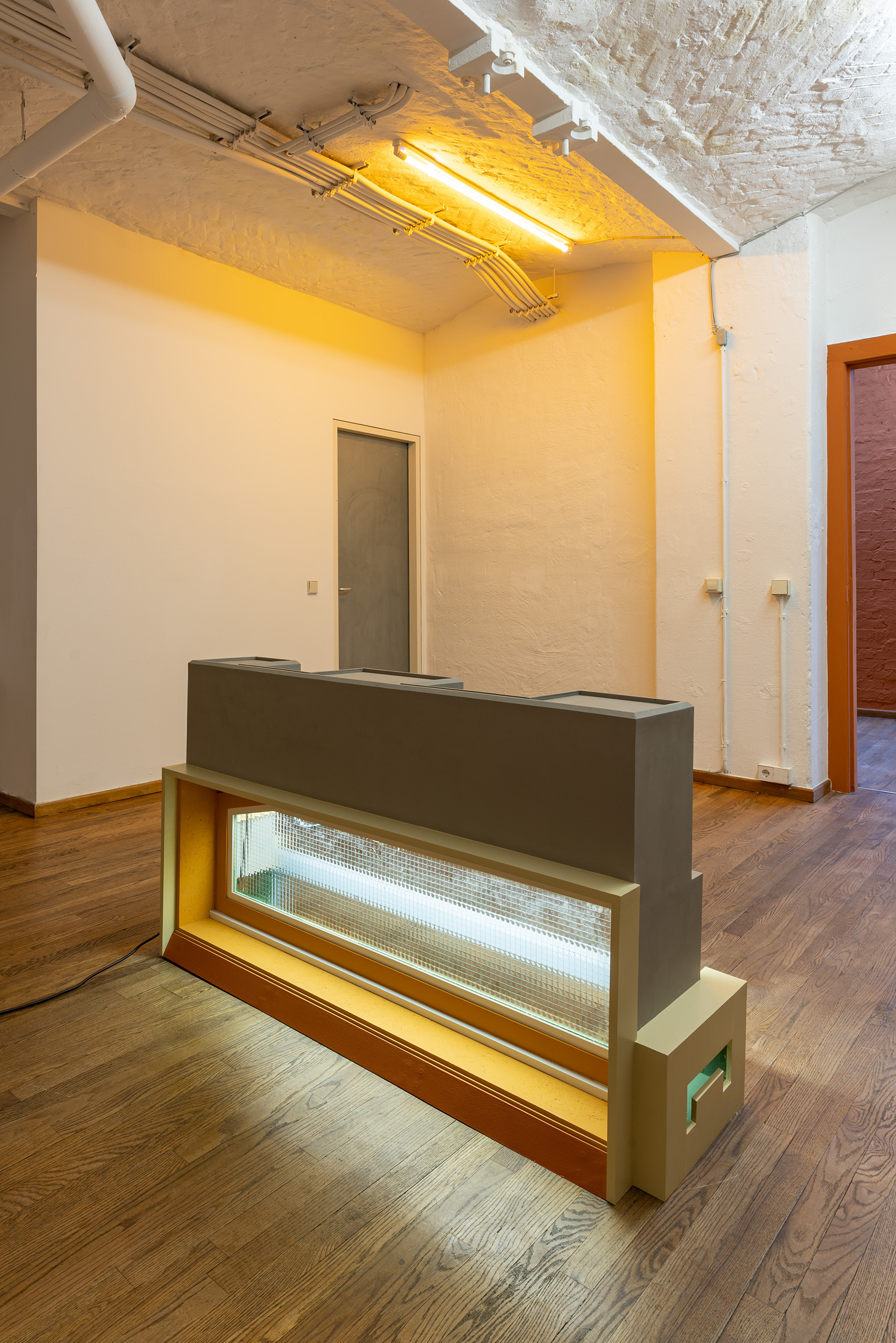 Levels, 2022. Wood, MDF, glass, light fixture, extension cable, enamel paint, acrylic paint, hardware, wood glue.