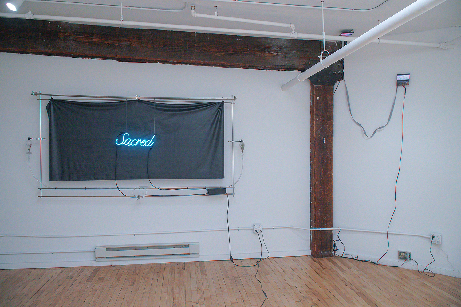 WHO IS PLUTO - Installation view, Subtitled NYC, 2022