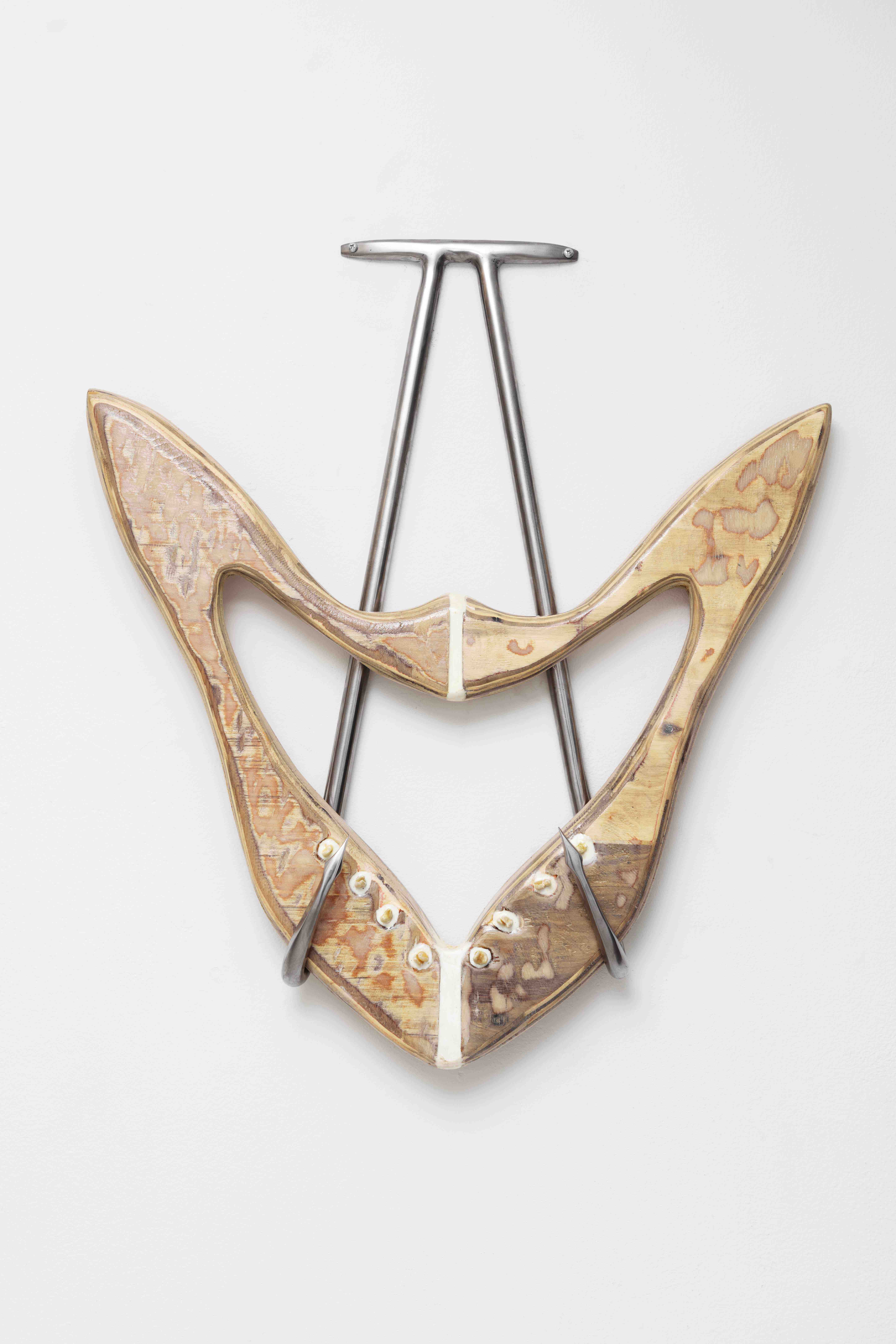 COMPOSED ARMOR, 2022; Plywood, steel, human teeth, casting resin, damiana, hydrangea, hyssop, nettle, ashwagandha, rose bud, red clover, calendula, thyme, steel