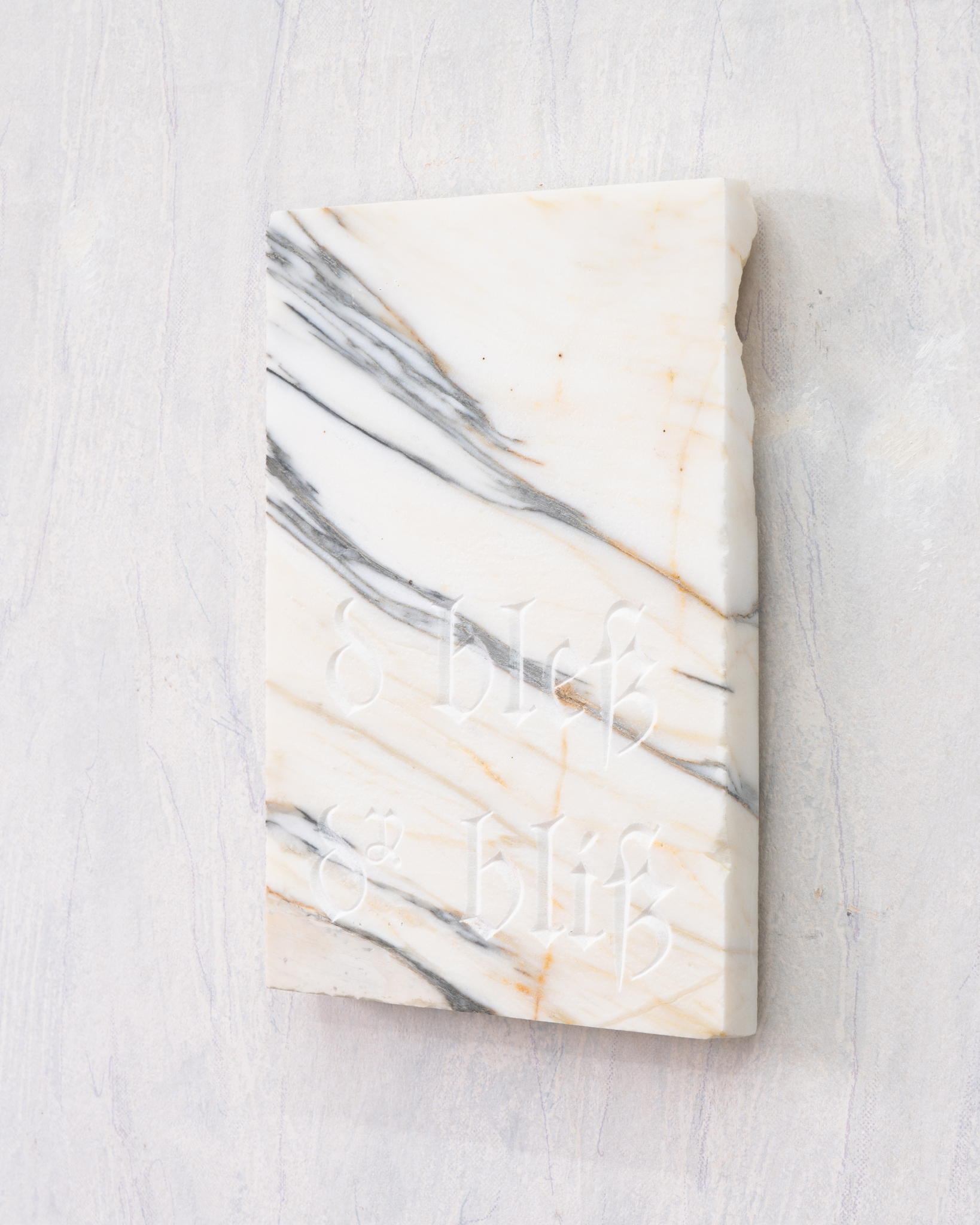 Maarten van Roy, Untitled (God Bless Daily Bliss), 2022, Calacatta Oro marble, 26 x 18 x 2 cm