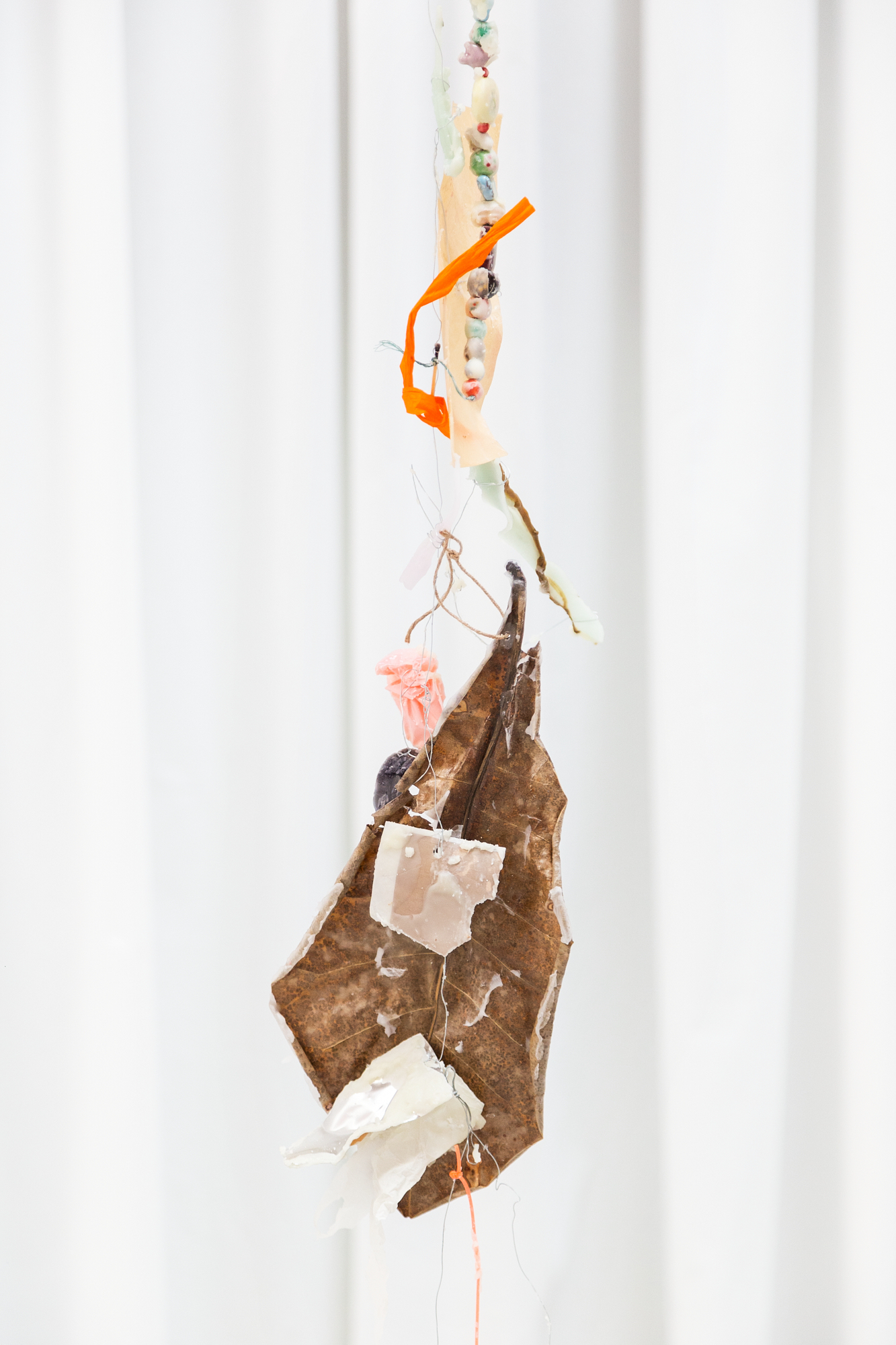 Installation View Detail, Reliquias II, Found objects, Aluminium wire, Paper and Wax, 3m high, 2022