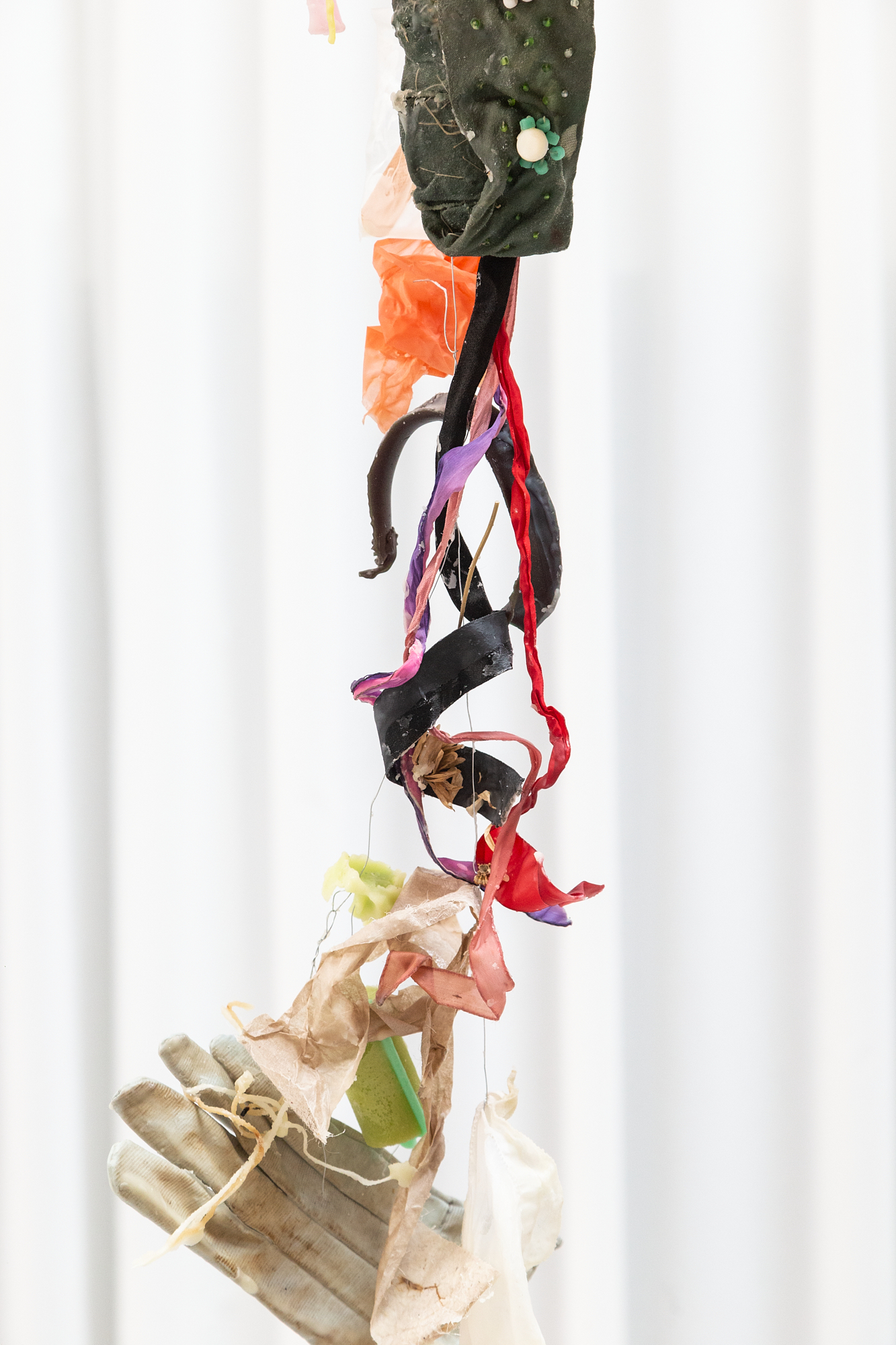 Installation View Detail, Reliquias II, Found objects, Aluminium wire, Paper and Wax, 3m high, 2022