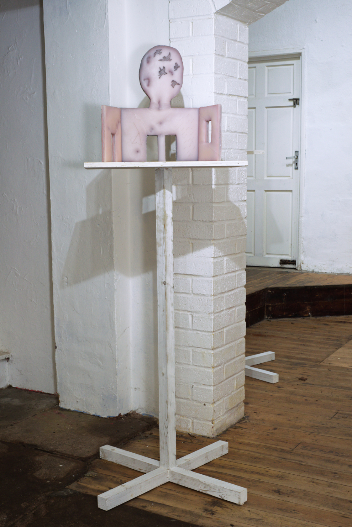 Poupak Sarah Shoughi, Bird Feeder 2, 2022; Silicone, aluminium, ink, hair. Stand: Wood, lime. Dimensions Variable