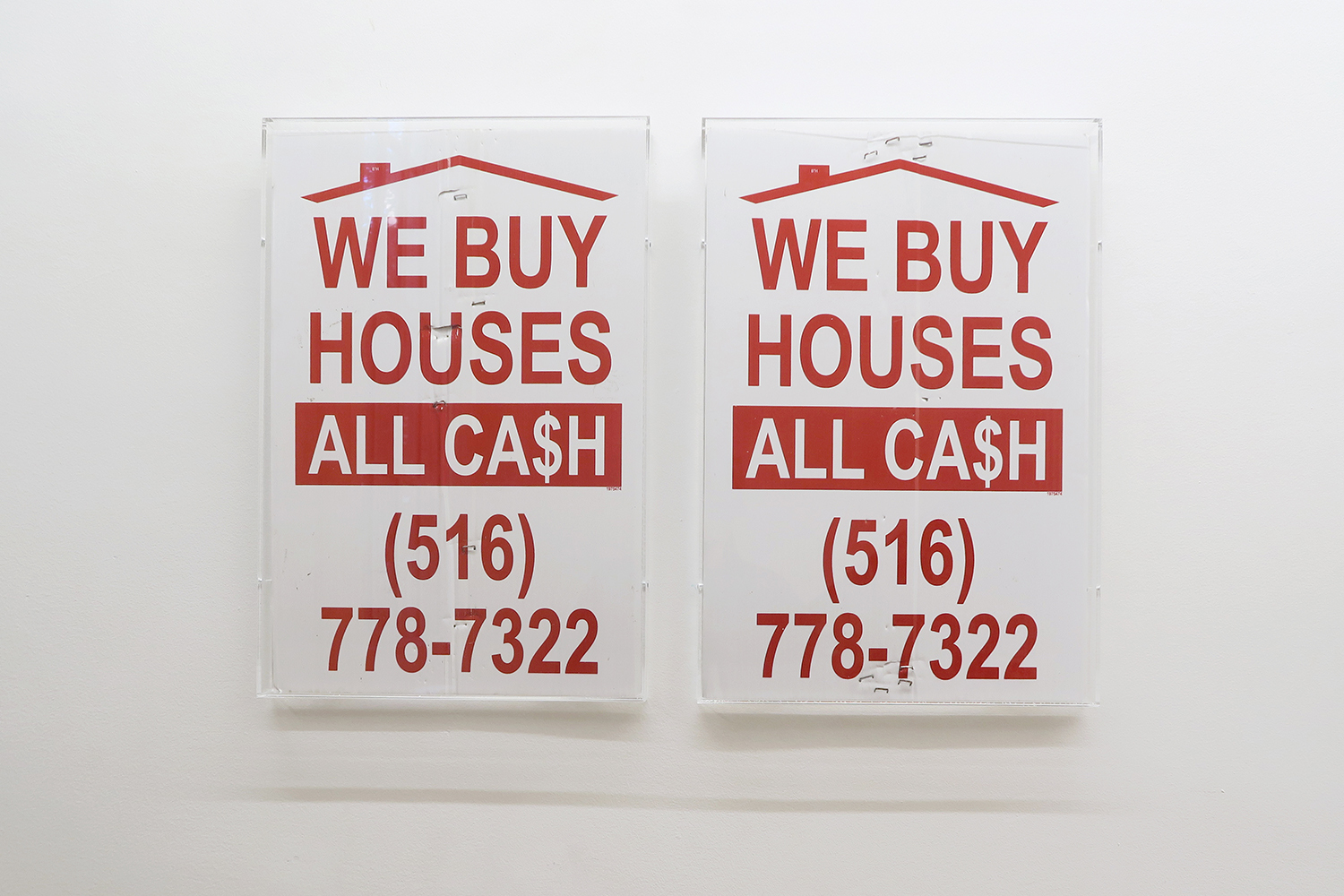 WE BUY HOUSES ALL CASH I and II, 2018 print on plastic, framed, 32 × 47 × 3.7 cm