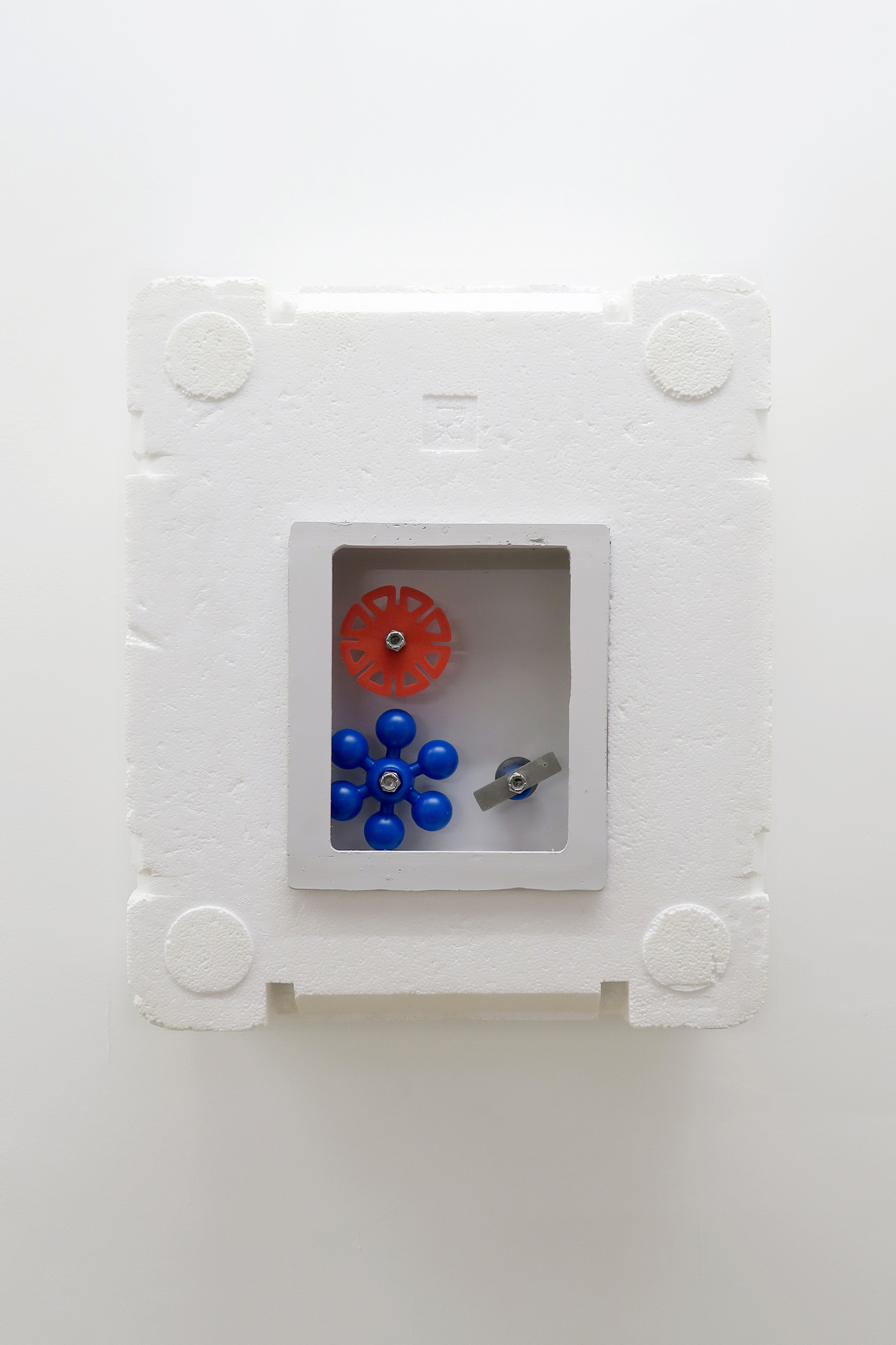 Simplify Complexity IV, 2022 Styrofoam box, brightly colored plastic pieces spin easily on stainless steel rods, 35.5 × 42 × 13.5 cm