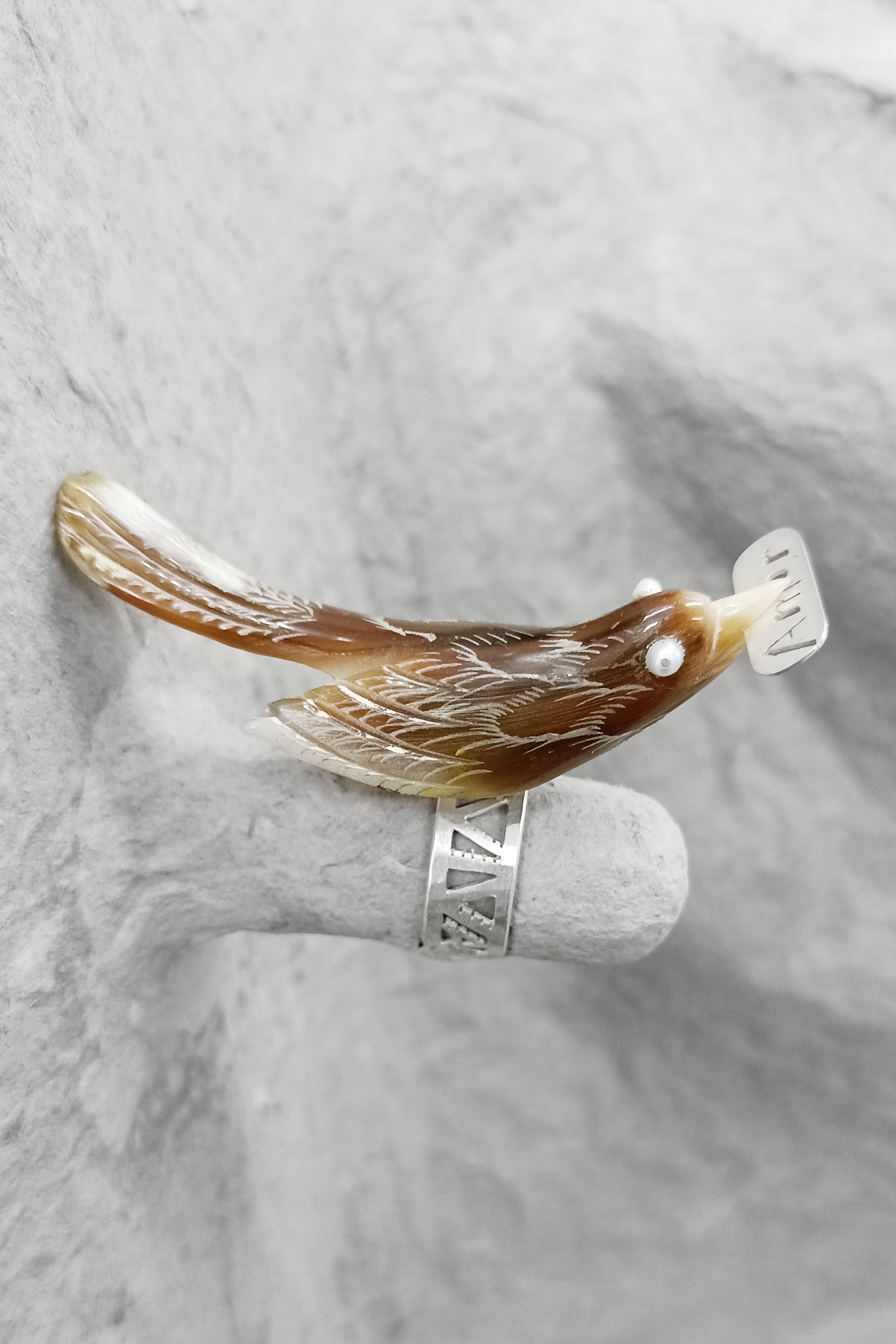10 Ulrike Johannsen, Amor, 2022. Horn, pearls and silver, 4x7x2,5 cm